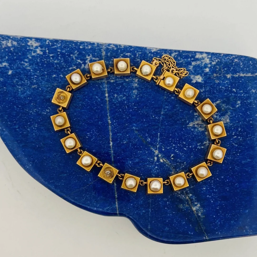 Yellow gold (750) bracelet consisting of 18 cubic links ador - Lot 255