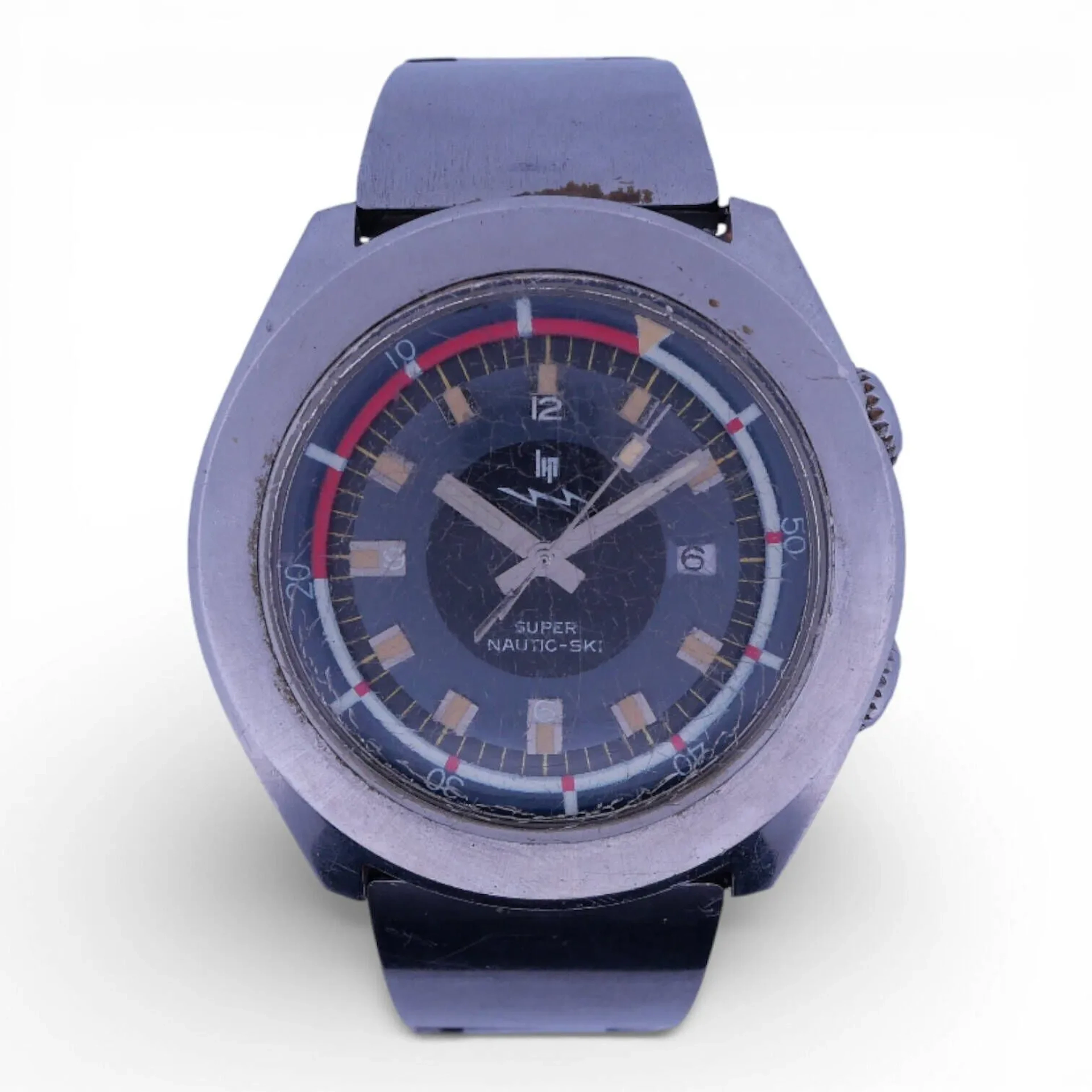 LIP « Super Nautic-Ski» Montre bracelet de plongée pour homme en acier, cadran bleu avec index bâtons et aiguilles luminescentes. Guichet dateur à 3 heures et lunette tournante interne. Mouvement électronique à quartz. Diam. 42 mm Plexi rayé Bracelet en acier à boucle déployante non signé