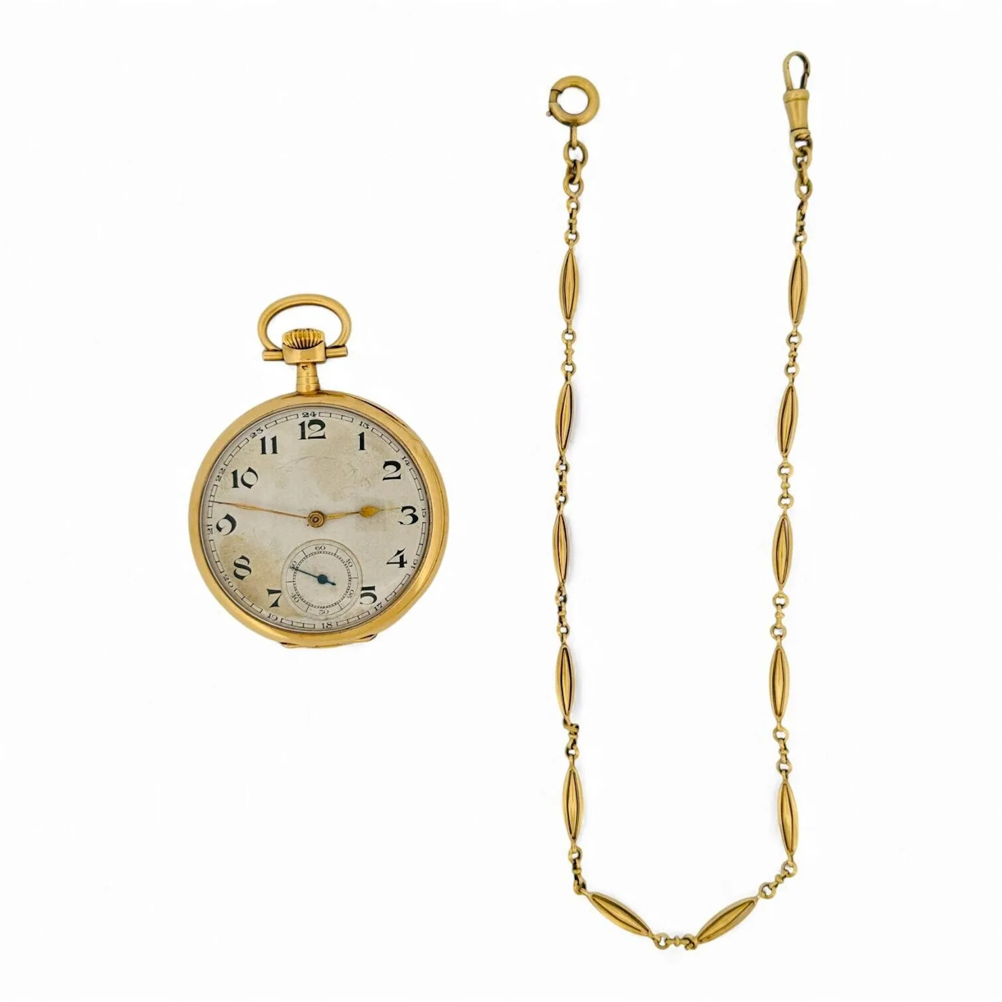 ANONYME Montre de gousset en or jaune (750) à décor rayonnant ciselé, cadran à chiffres arabes pour les heures, compteur à 6 heures, aiguilles dorées. Numérotée 64760. Mouvement mécanique. Travail des années 1930 Poinçon: tête d'aigle Poids brut: 59 gr Chocs On y joint un chaîne de montre en or 18 carats (750) Poinçon mixte Poids brut: 11,7 gr