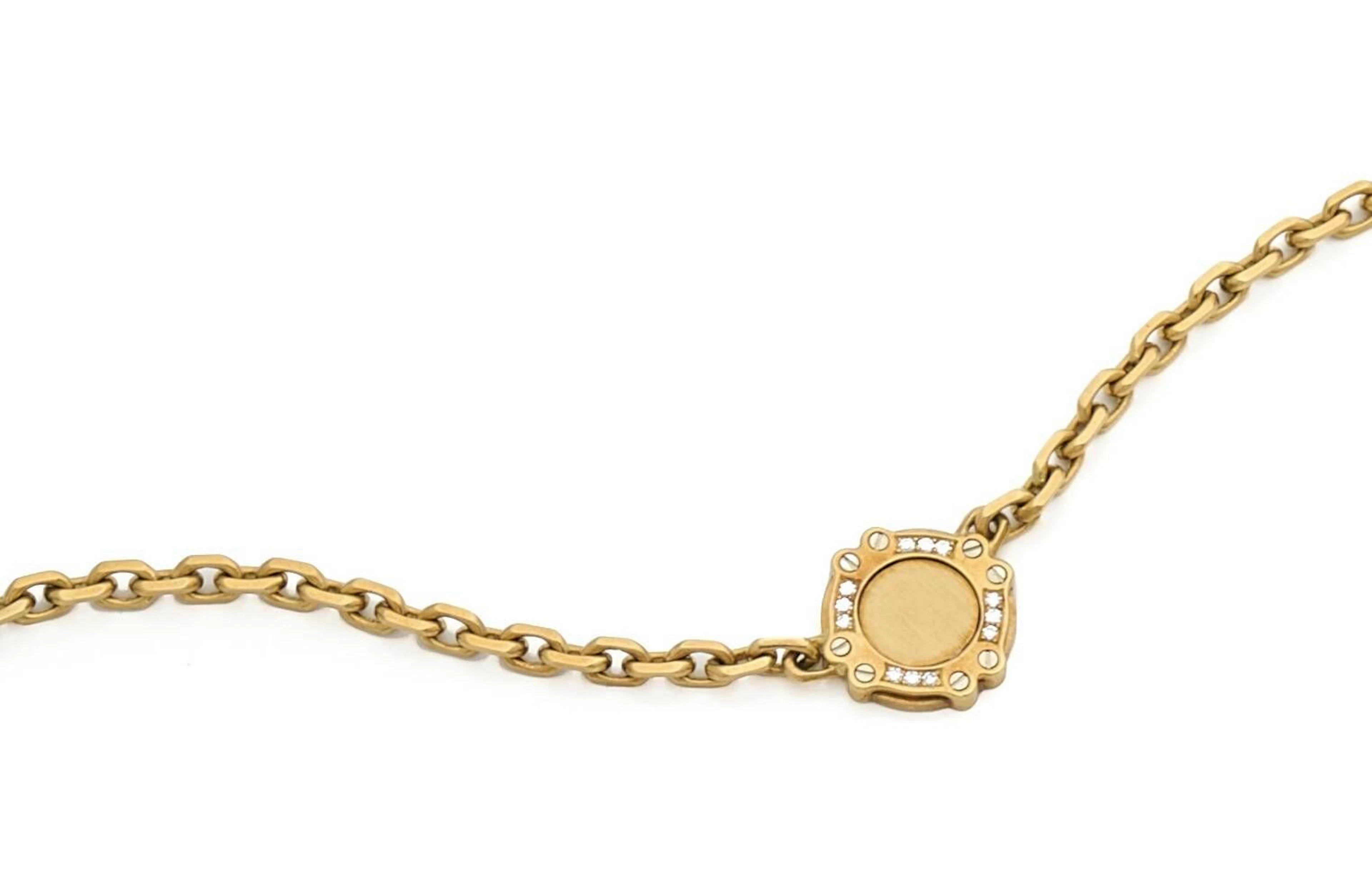 CHOPARD Demi parure en or 18K (750) comprenant : un collier centré d'un motif agrémenté de diamants ronds de taille brillant, de vis en or gris ; un bracelet en or 18K agrémenté de 2 diamants ronds de taille brillant. Collier signé, les deux numérotés. Longueurs respectives : 41 et 18 cm environ. Poids brut : 37,4 g