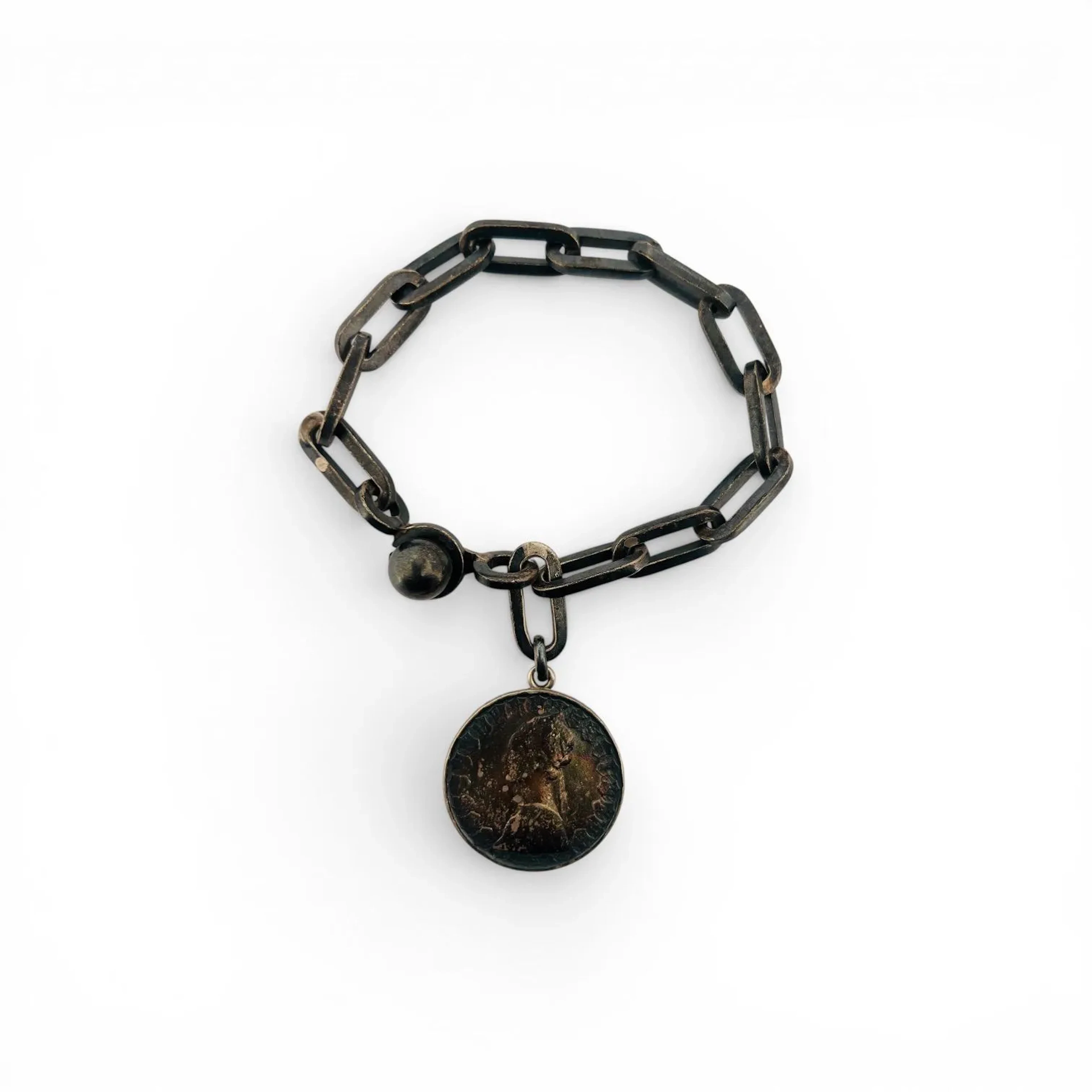 Part of a silver (800) wide forçat chain holding an Italian - Lot 205