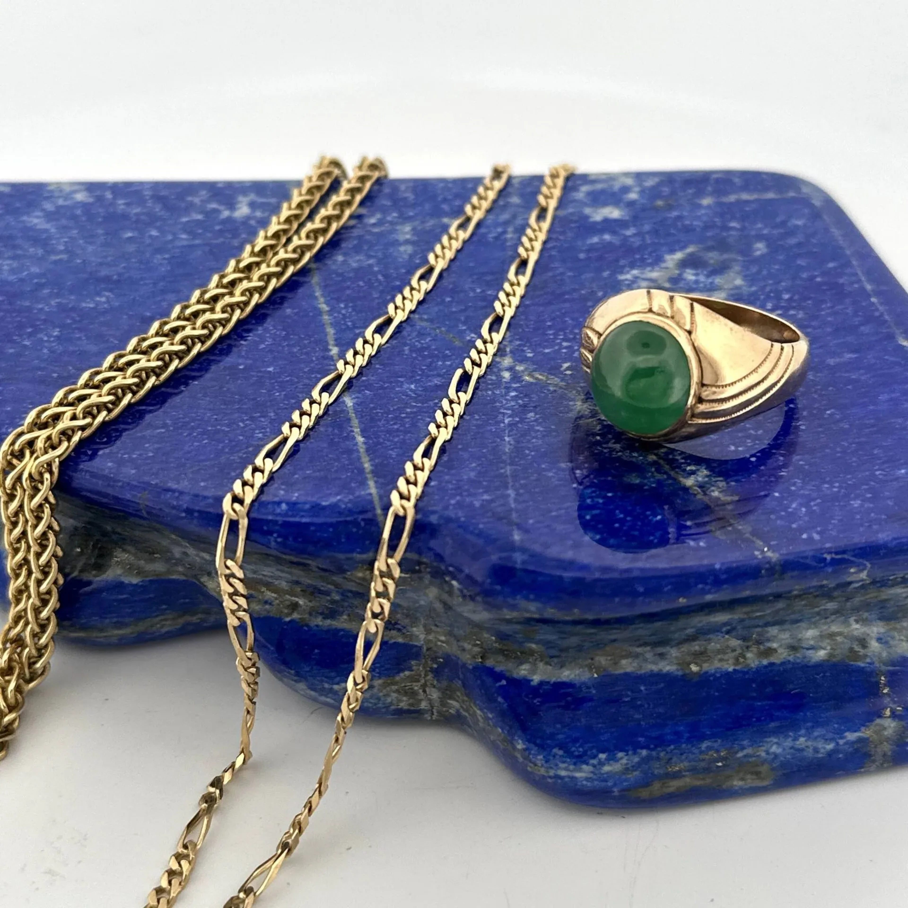 Set in 14-karat yellow and rose gold (585), consisting of: - Lot 243