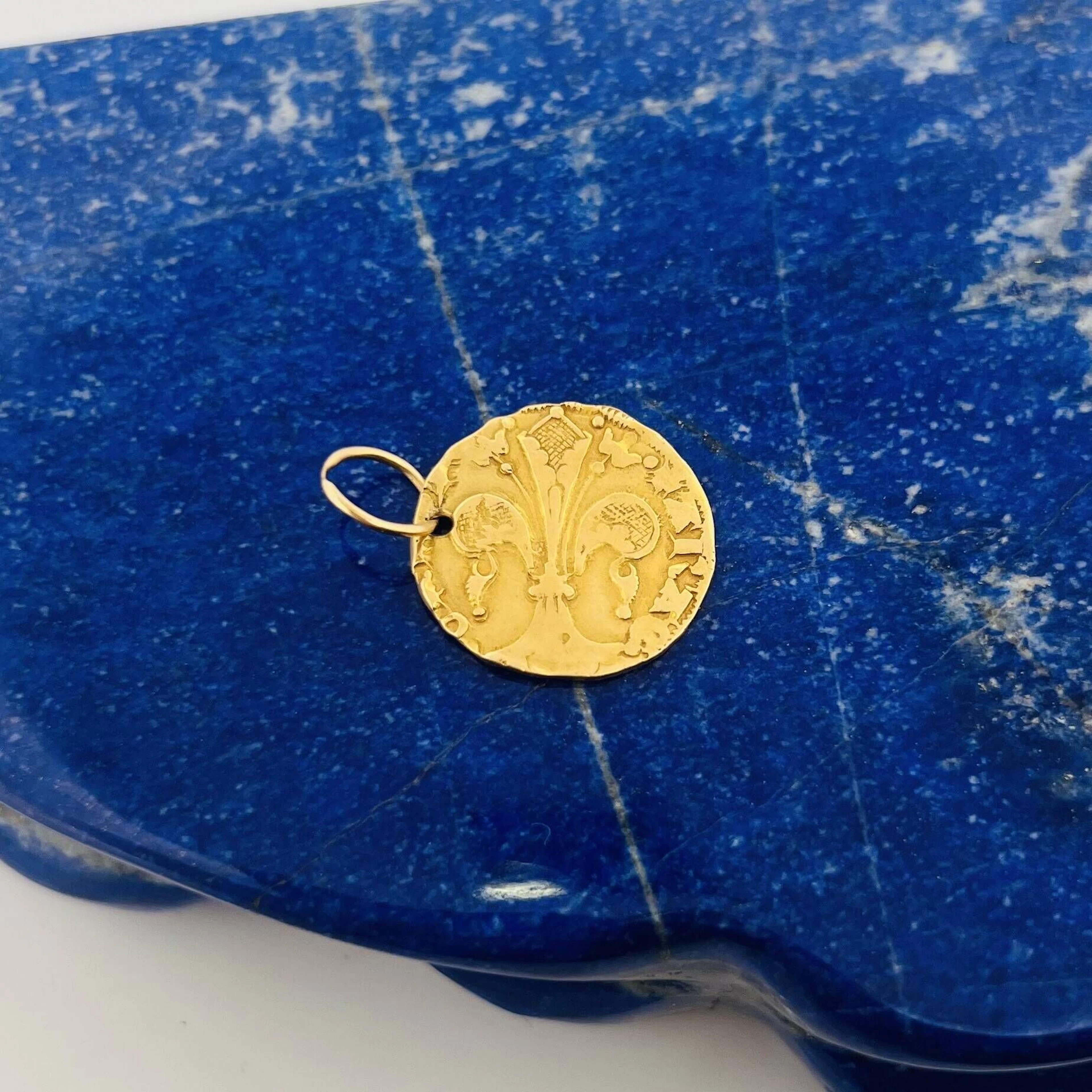 Yellow gold (750) pendant holding a misshapen coin. - Lot 259