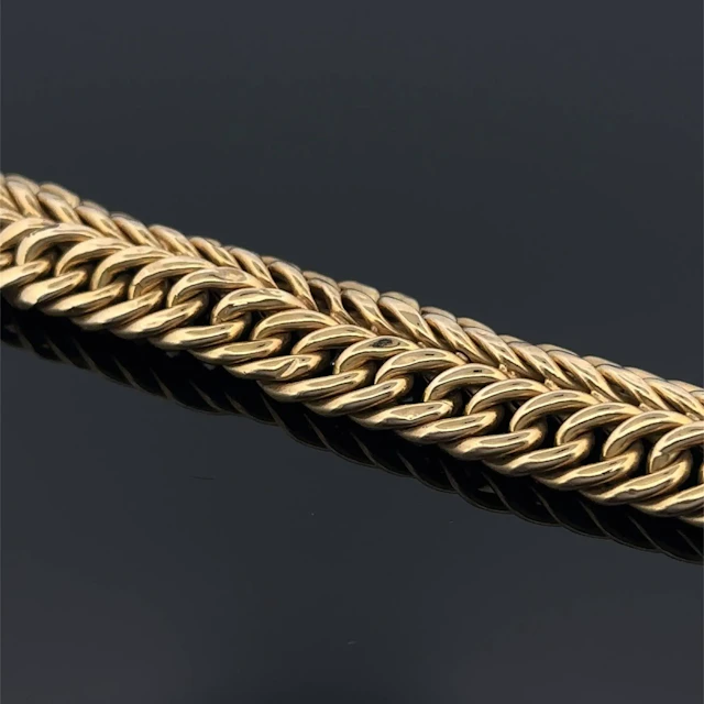 Yellow gold (750) bracelet with a witch's link design. - Lot 228