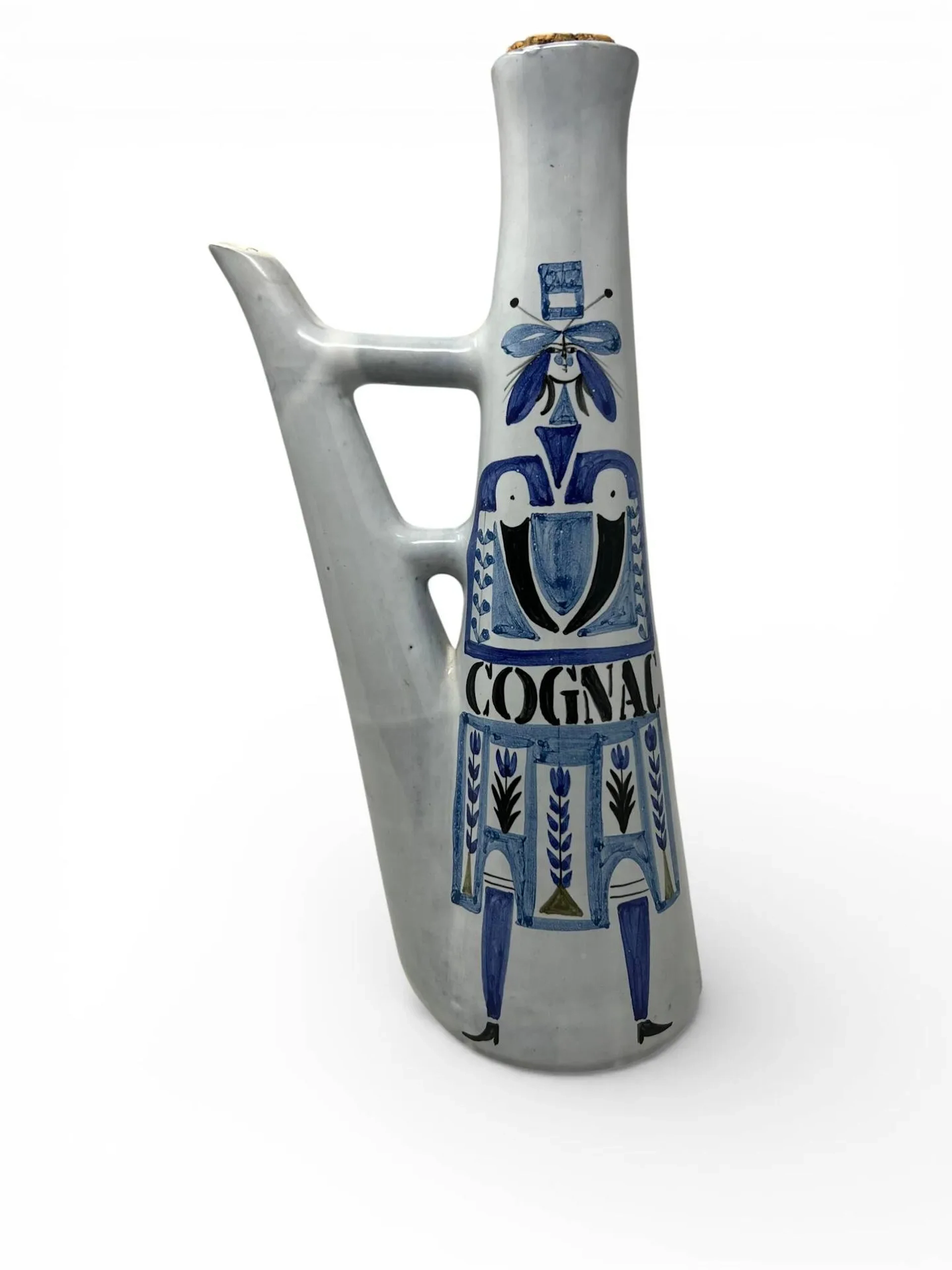Roger CAPRON (1922-2006) Bouteille Cognac, à décor d’un cavalier, circa 1958 Épreuve en céramique émaillée gris, bleu et noir Signé Capron, situé Vallauris et porte les inscriptions M1 et 038 sur l’envers H. : 31.6 cm. Bibliographie : - Pierre Staudenmeyer, Roger Capron, céramiste, Edition Norma, 2003, modèle similaire reproduit p. 53.