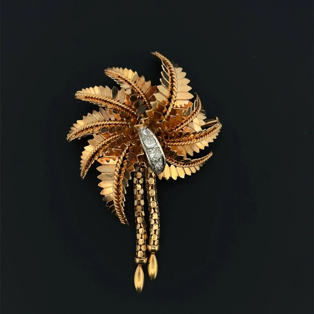 Openwork, twisted yellow gold (750) "palm tree" brooch, feat - Lot 283