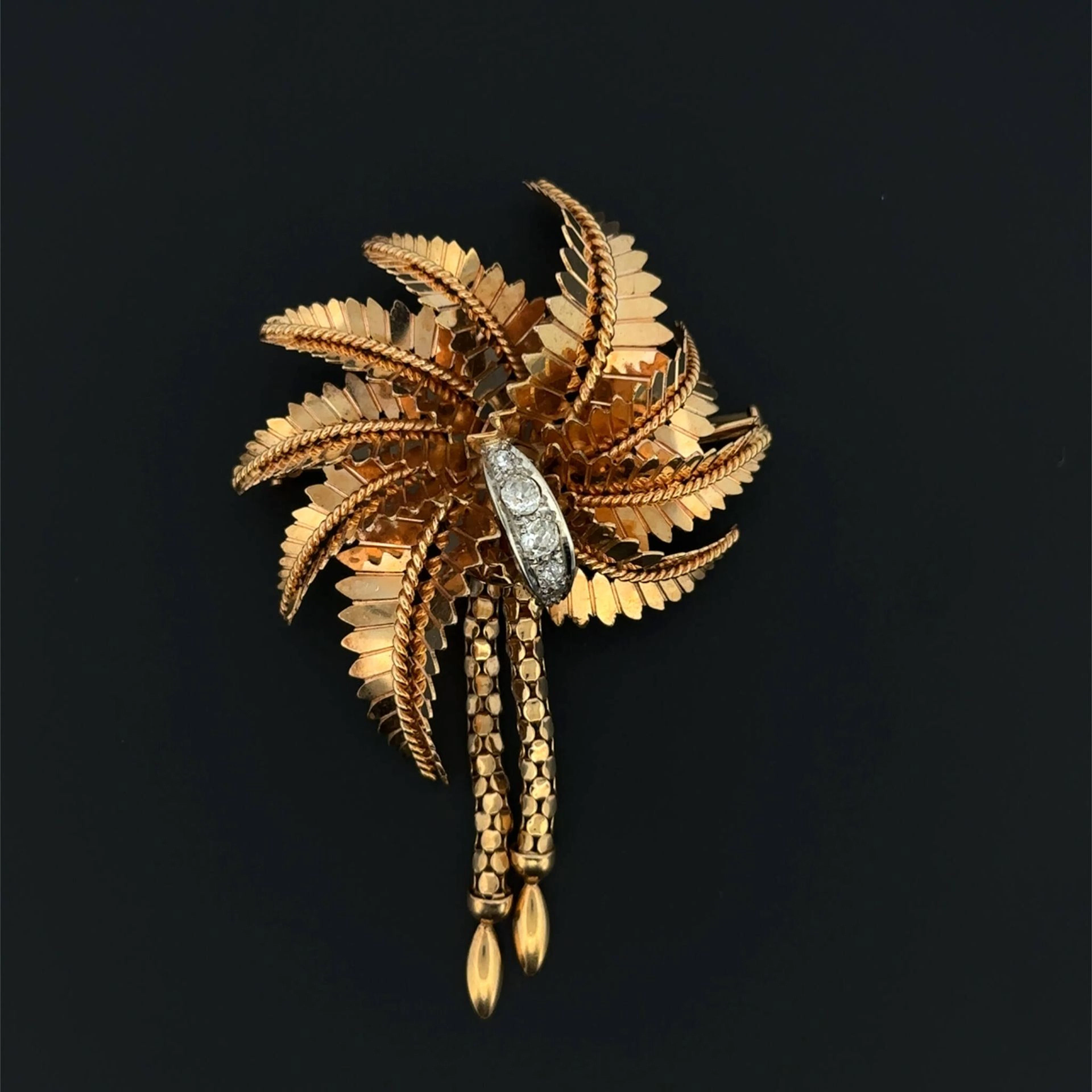 Openwork, twisted yellow gold (750) "palm tree" brooch, feat - Lot 283
