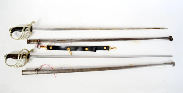 Set of two Model 1882 infantry officer’s sabers. - Lot 35