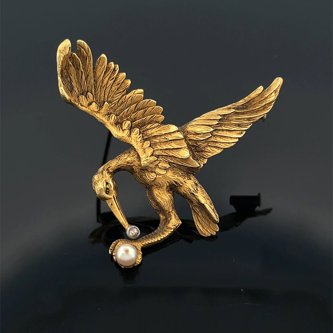 Yellow gold (750) "heron" brooch, entirely chased, with an o - Lot 175