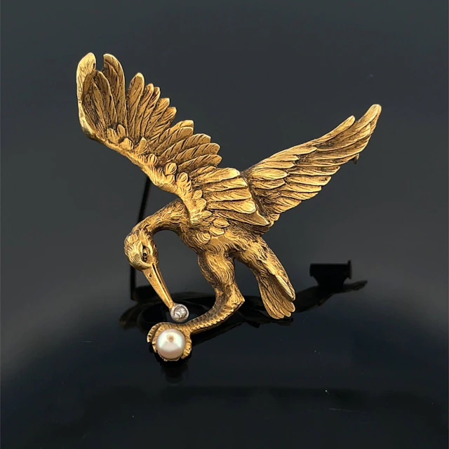 Yellow gold (750) "heron" brooch, entirely chased, with an o - Lot 175