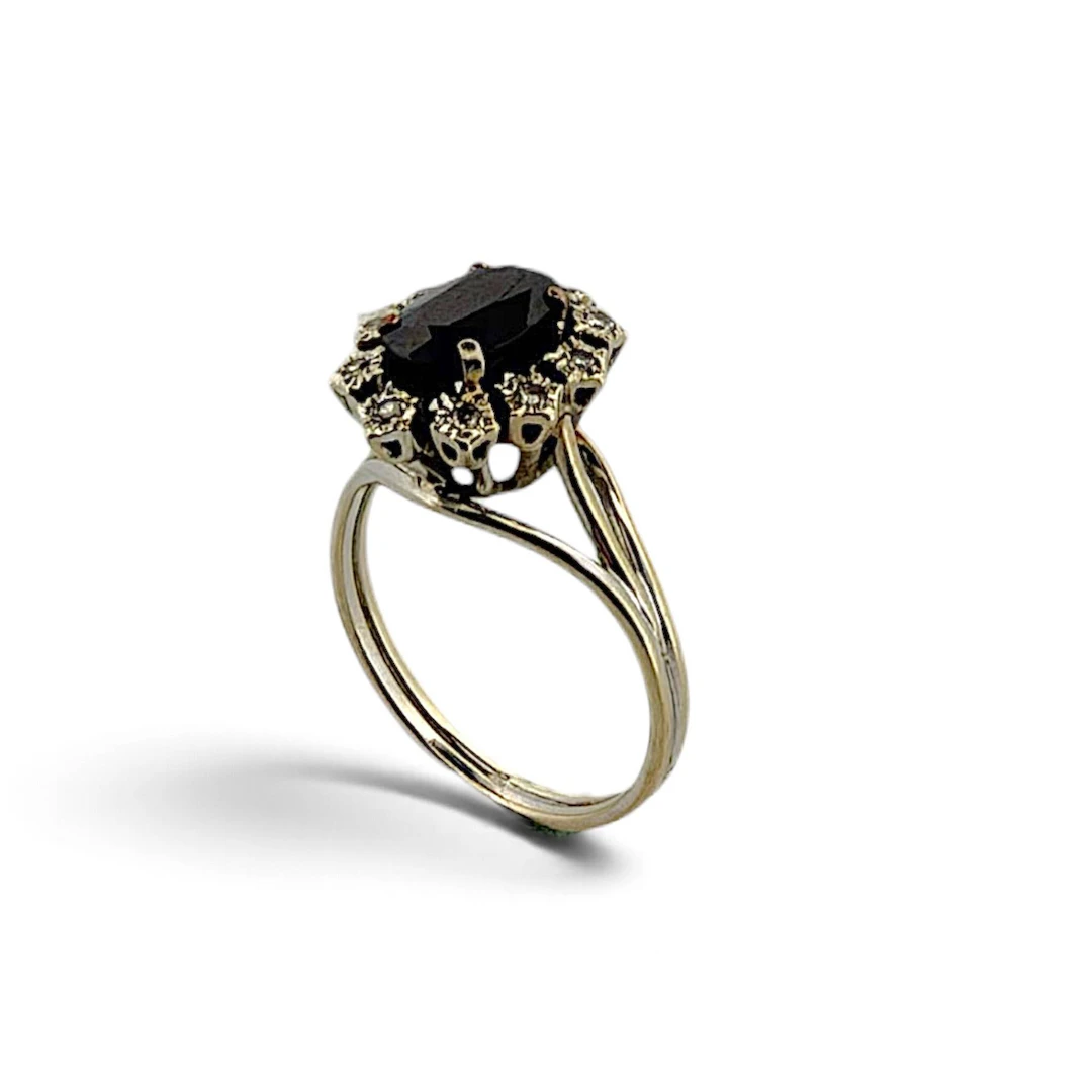 "Daisy" ring in white gold (750‰) set with an oval sapphire - Lot 313