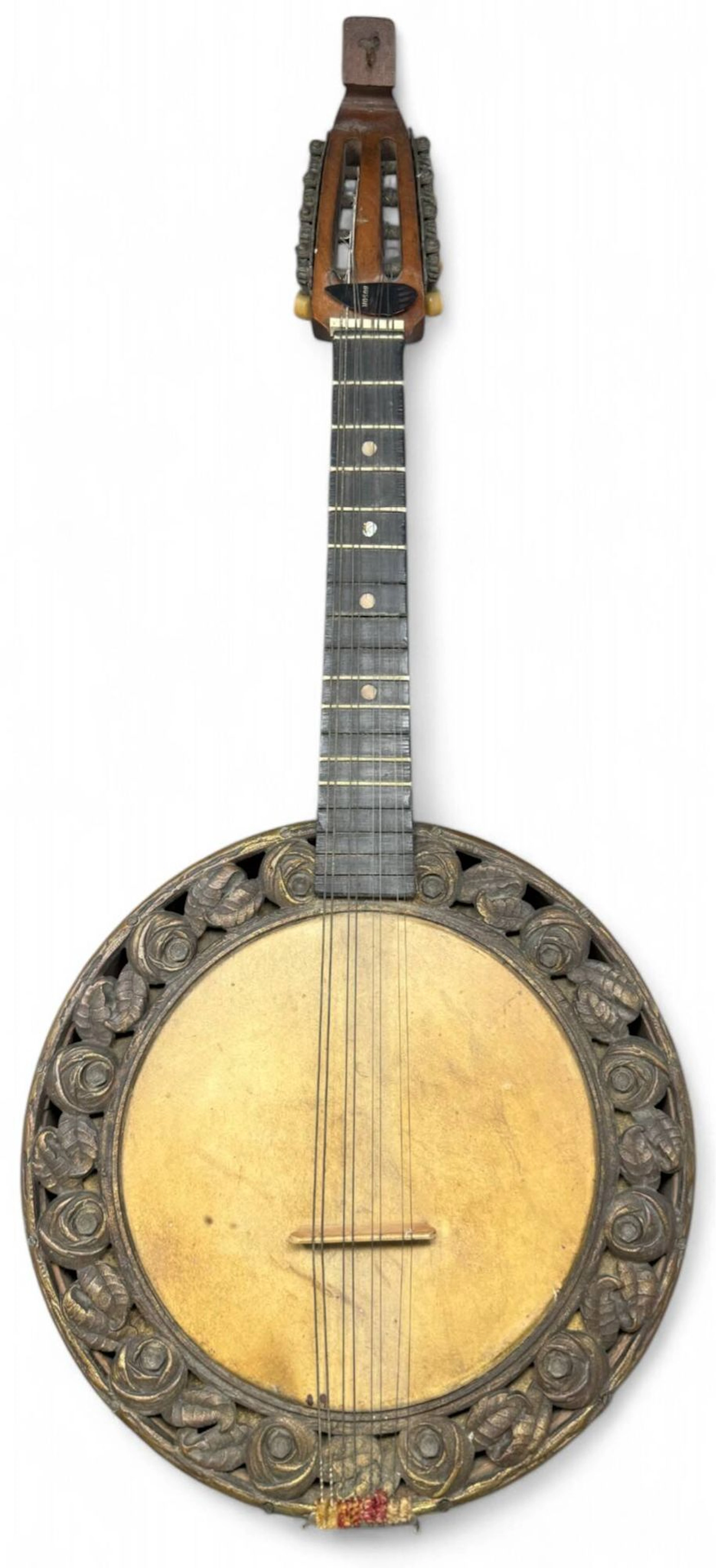 Wooden mandolin with carved stylized floral designs and a ma - Lot 519