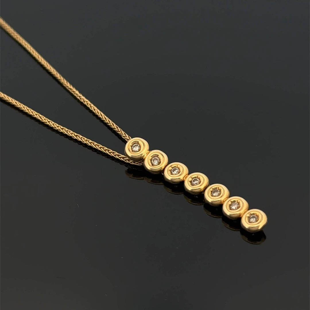 Yellow gold (750) necklace with a palm-leaf link design, fea - Lot 246