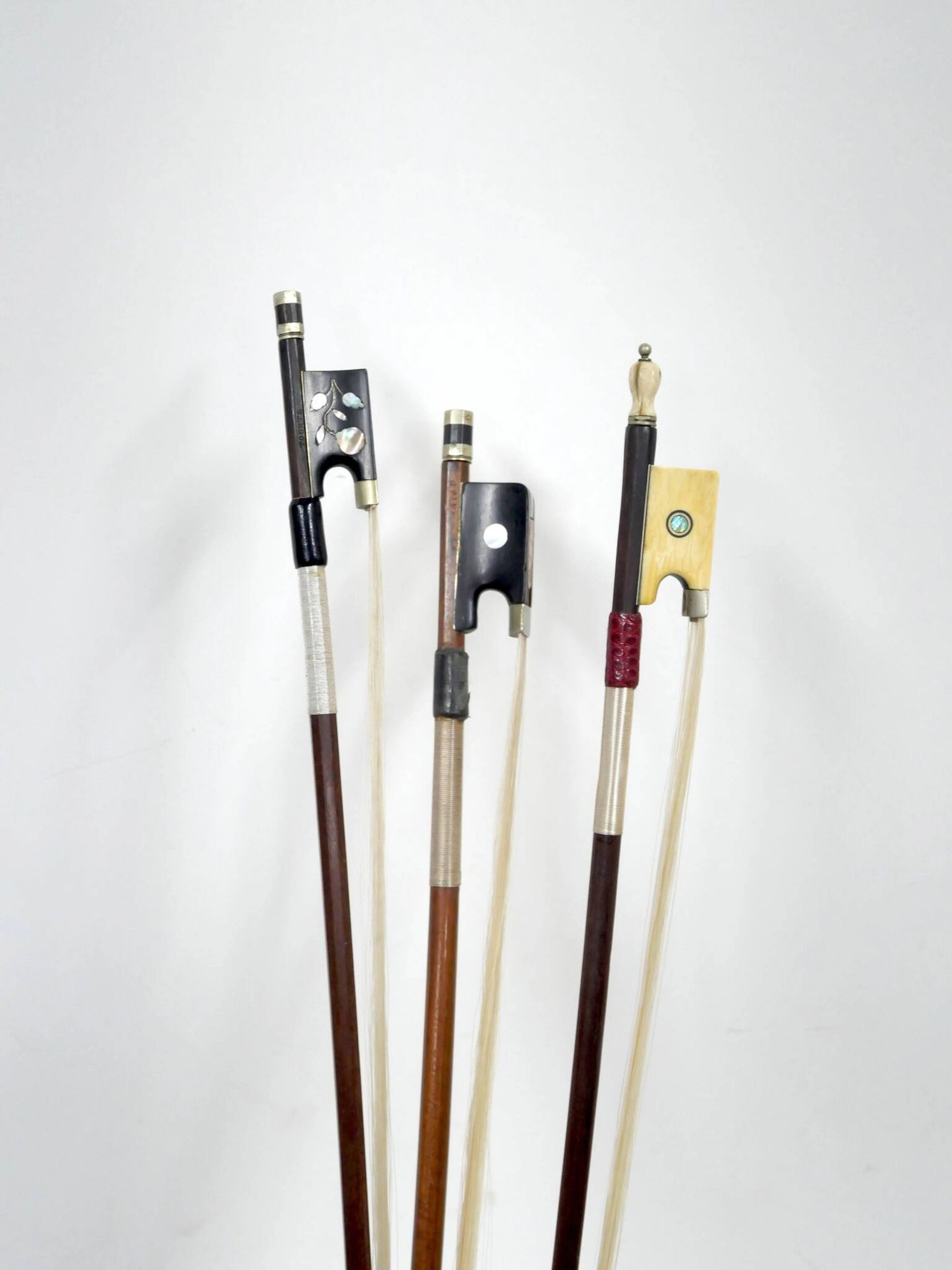 Three student bows (two for violin, one for cello) - Lot 347