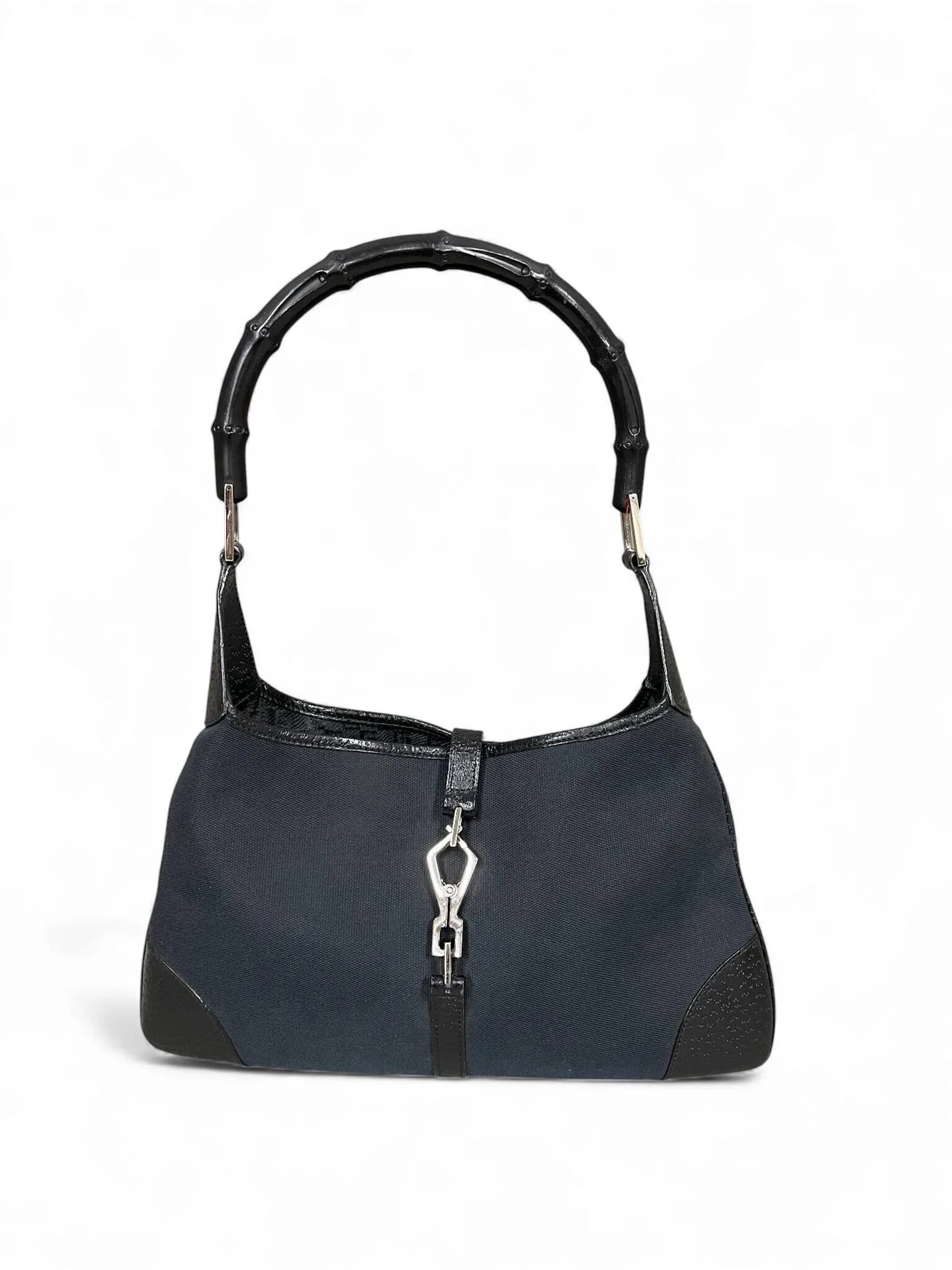 GUCCI Sac porté épaule en toile et pécari noir Bijouterie en métal palladié Doublure en tissu noir Bon état, très légèrestraces sur la toile Dimensions : 33x20x7 cm environ