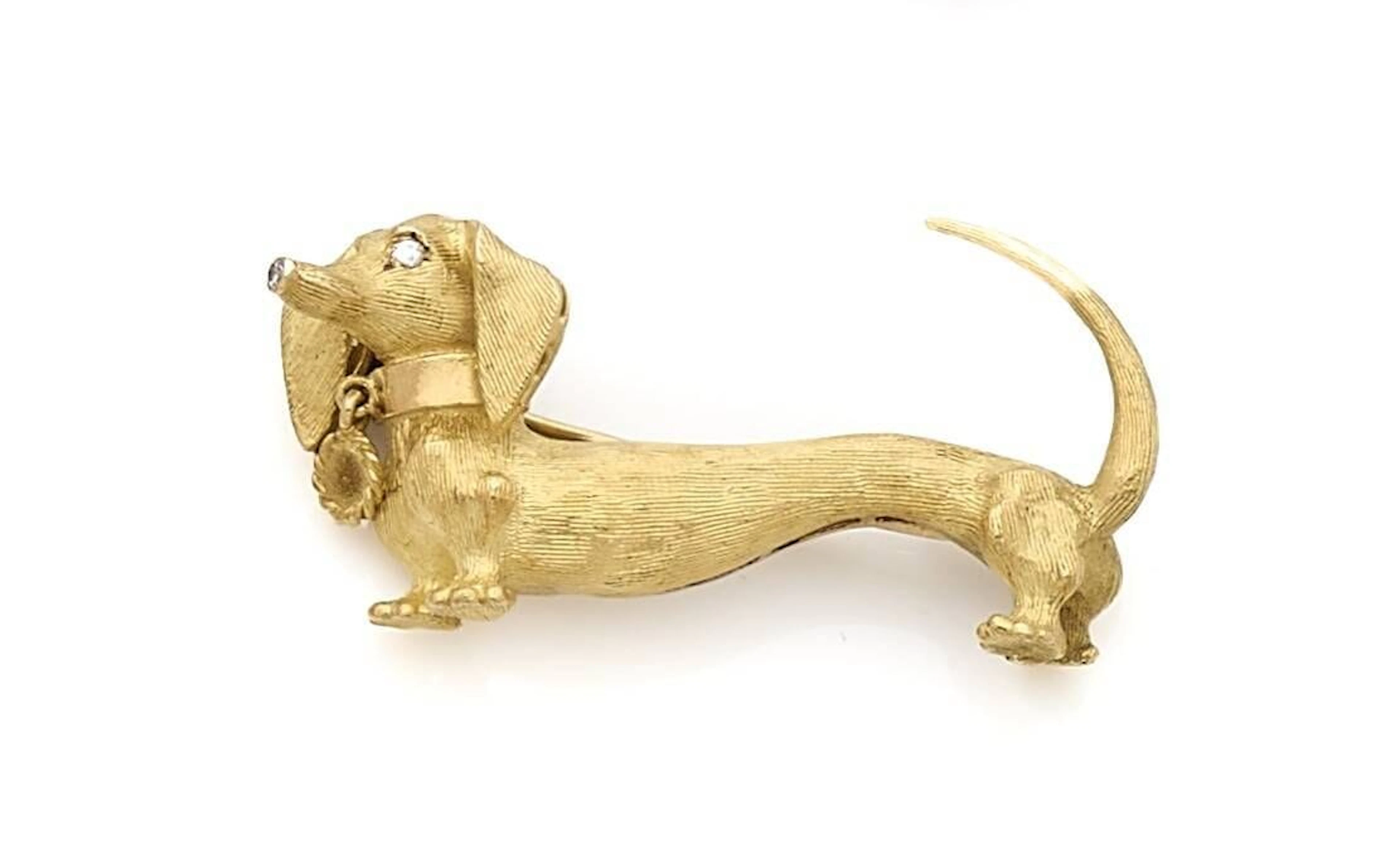 18K (750) gold brooch depicting a dachshund, eyes and nose e - Lot 116