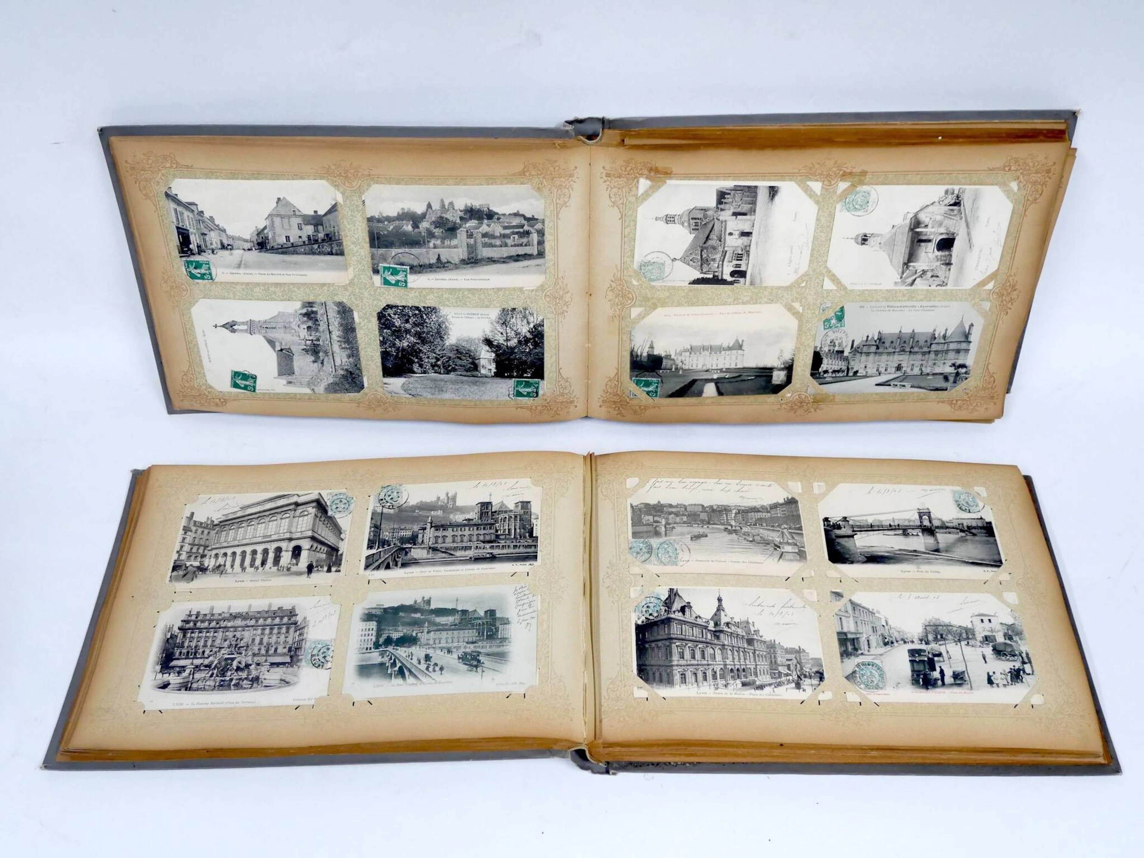 Two large albums of postcards, including - Lot 54