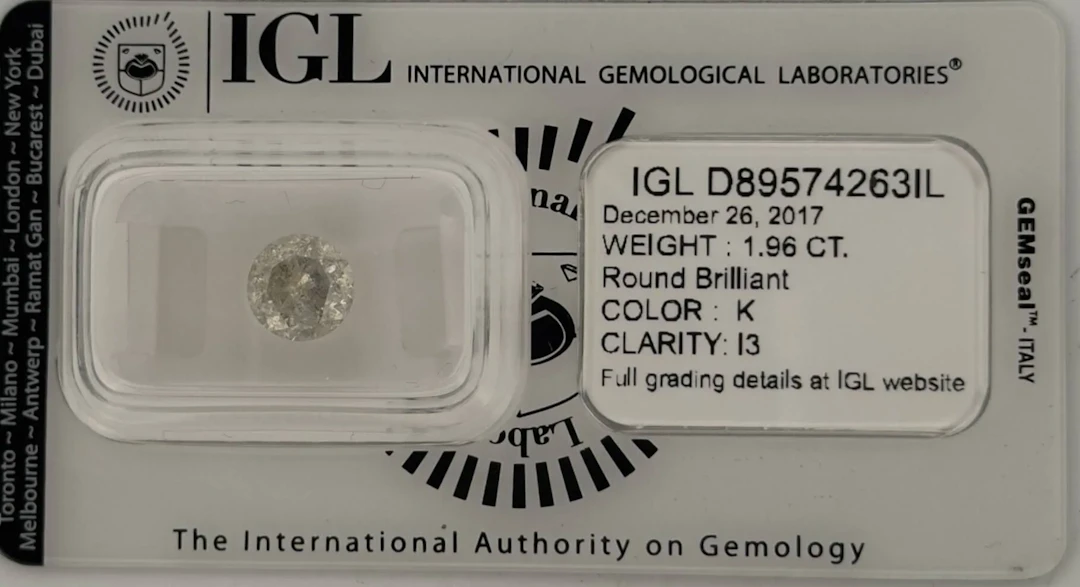 Sealed modern round diamond weighing 1.96 carat. It is accom - Lot 369