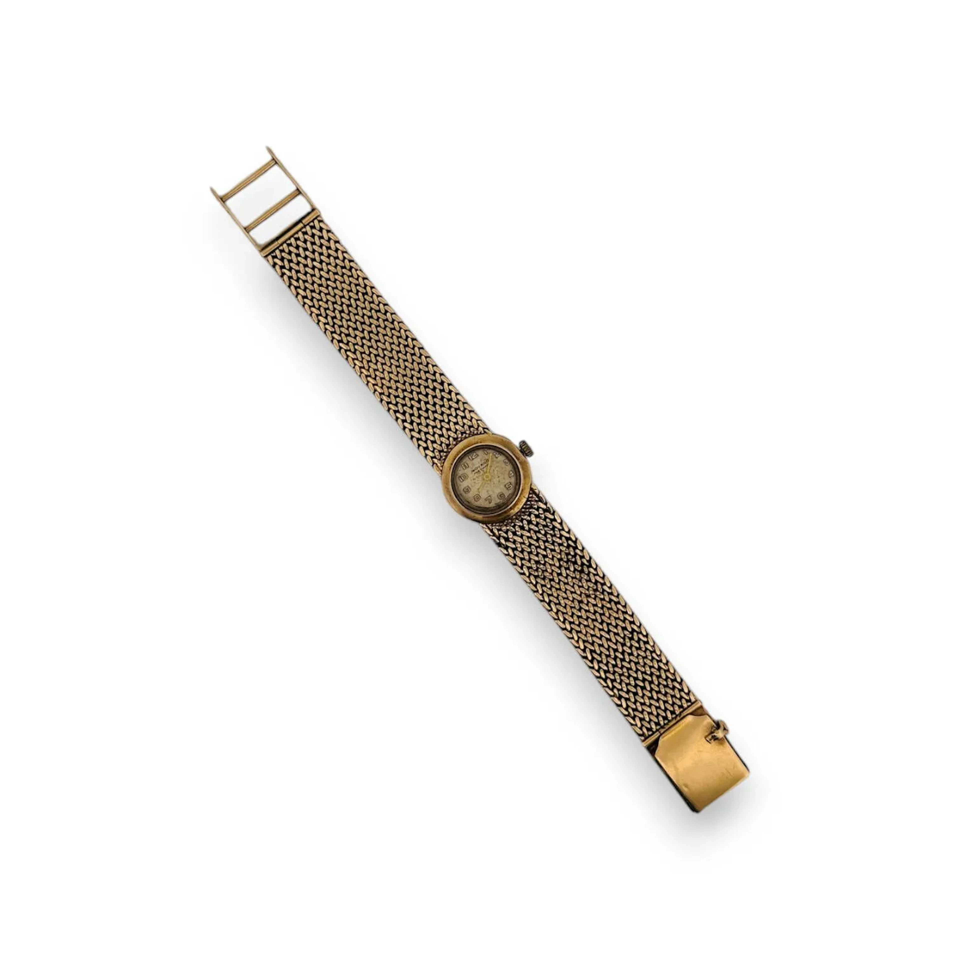 MOVADO Montre bracelet de dame en or jaune 18K (750), cadran doré (piqué et oxydé), index chiffres arabes formant les heures, mouvement quartz (pile non vérifiée), bracelet intégré en or 18K à maille polonaise et fermoir à cliquet. Diam. : 19 mm - Poids brut : 34.49 g.