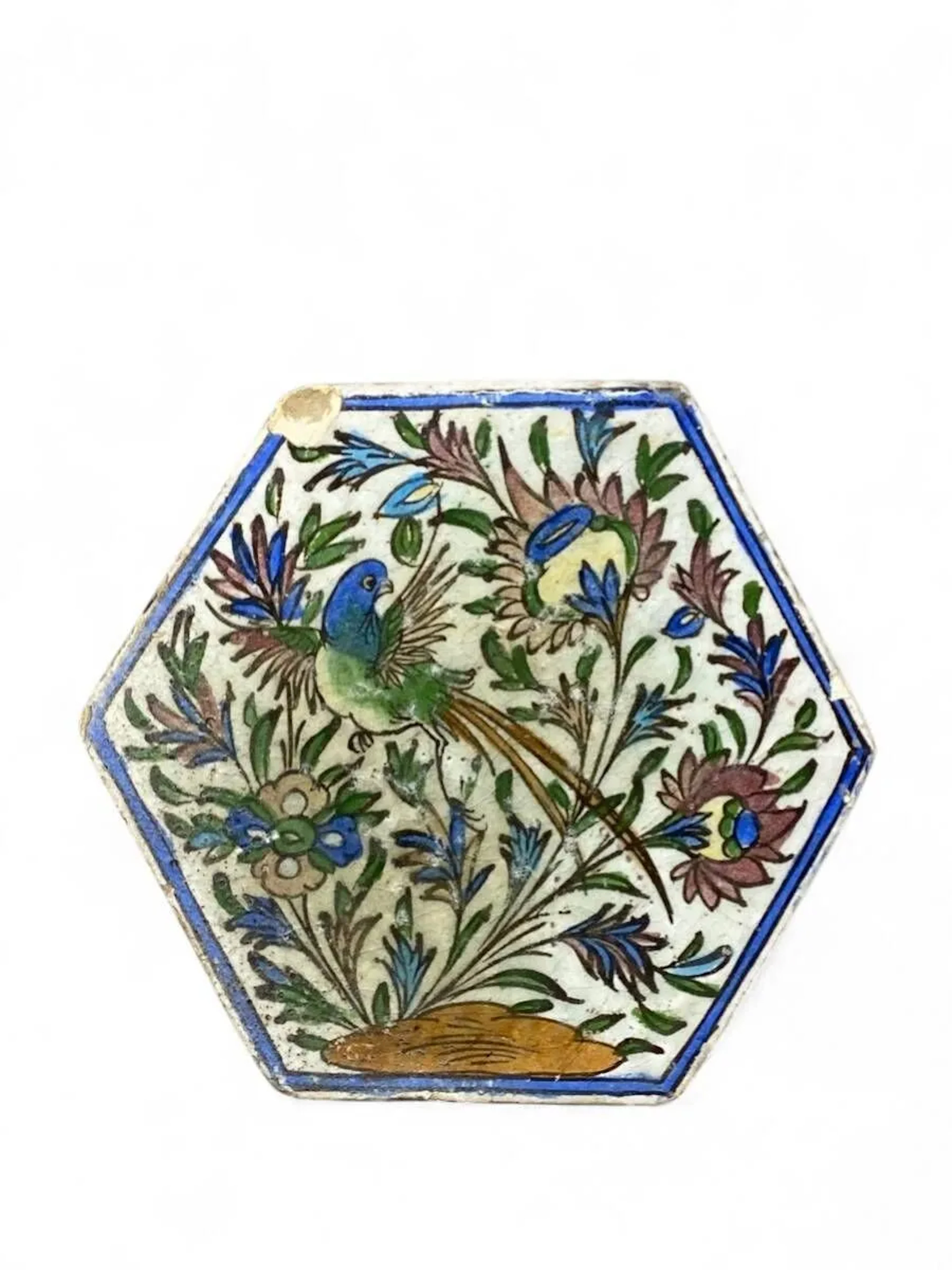 Large hexagonal ceramic wall tile with a design painted unde - Lot 95