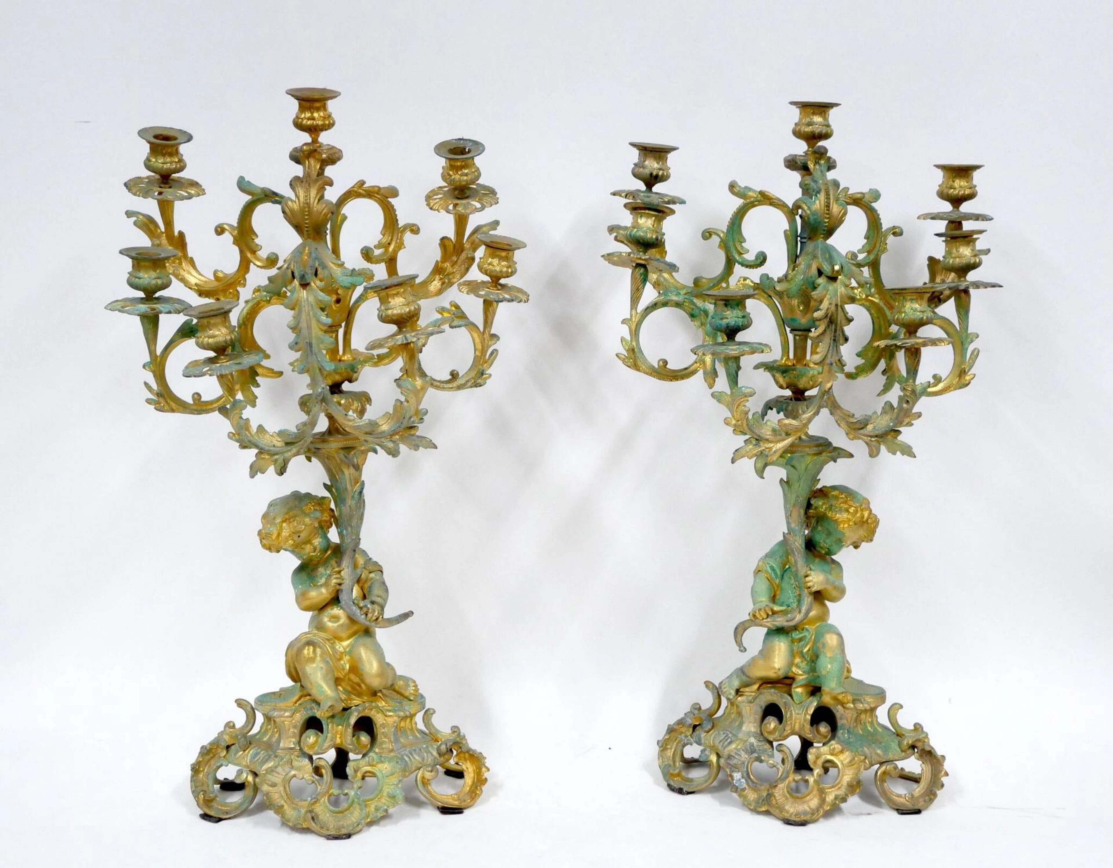 Pair of gilded bronze candelabra depicting a draped, seated - Lot 198