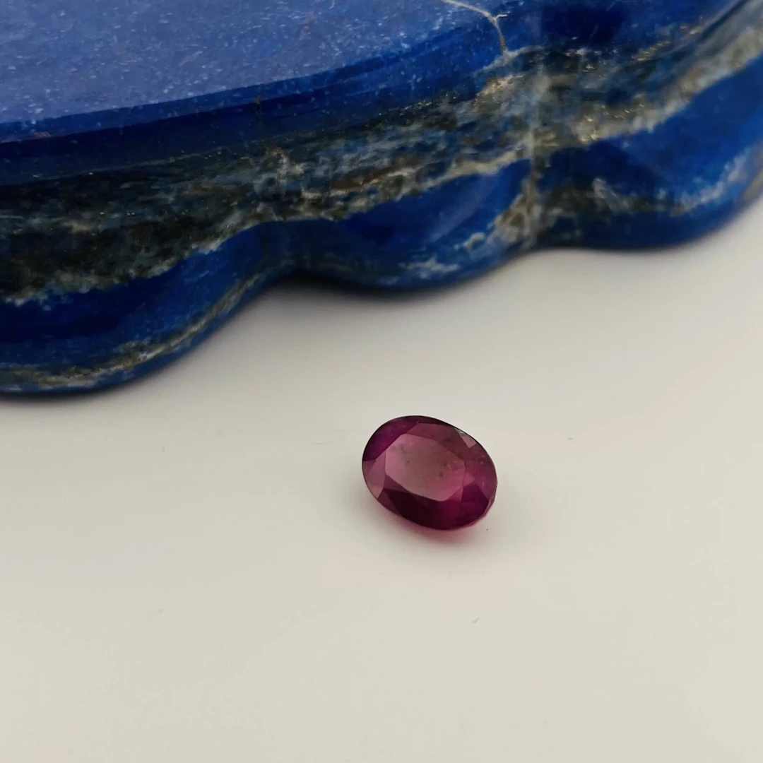 Oval ruby on paper weighing 6.89 carats. Accompanied by an A - Lot 366