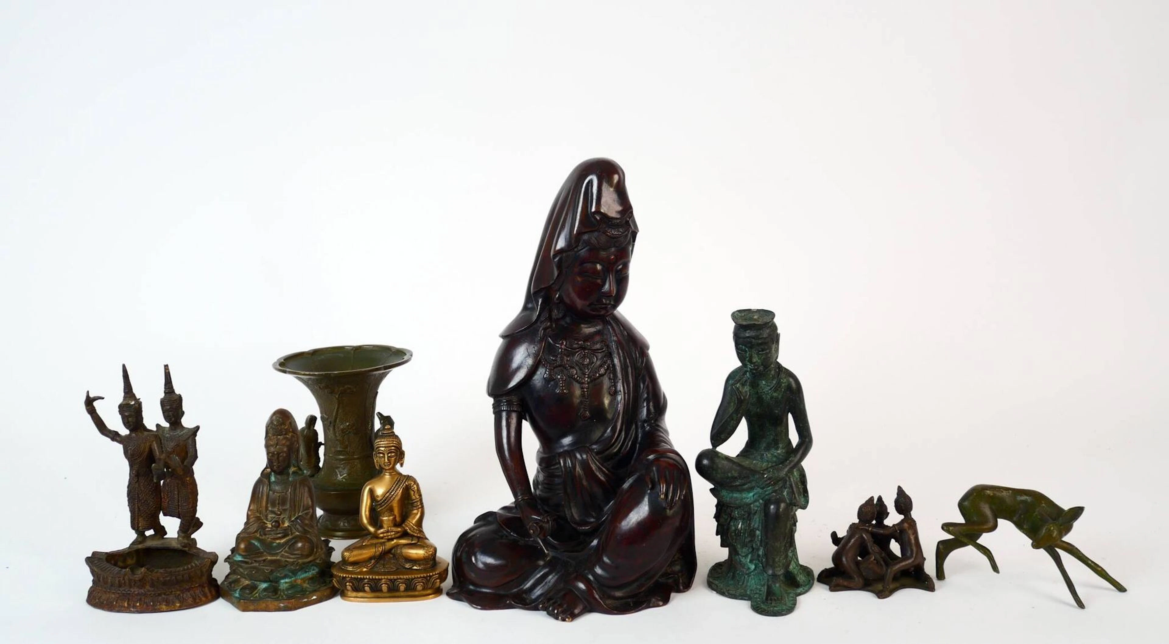 Set of bronze sculptures depicting Asian subjects, - Lot 81