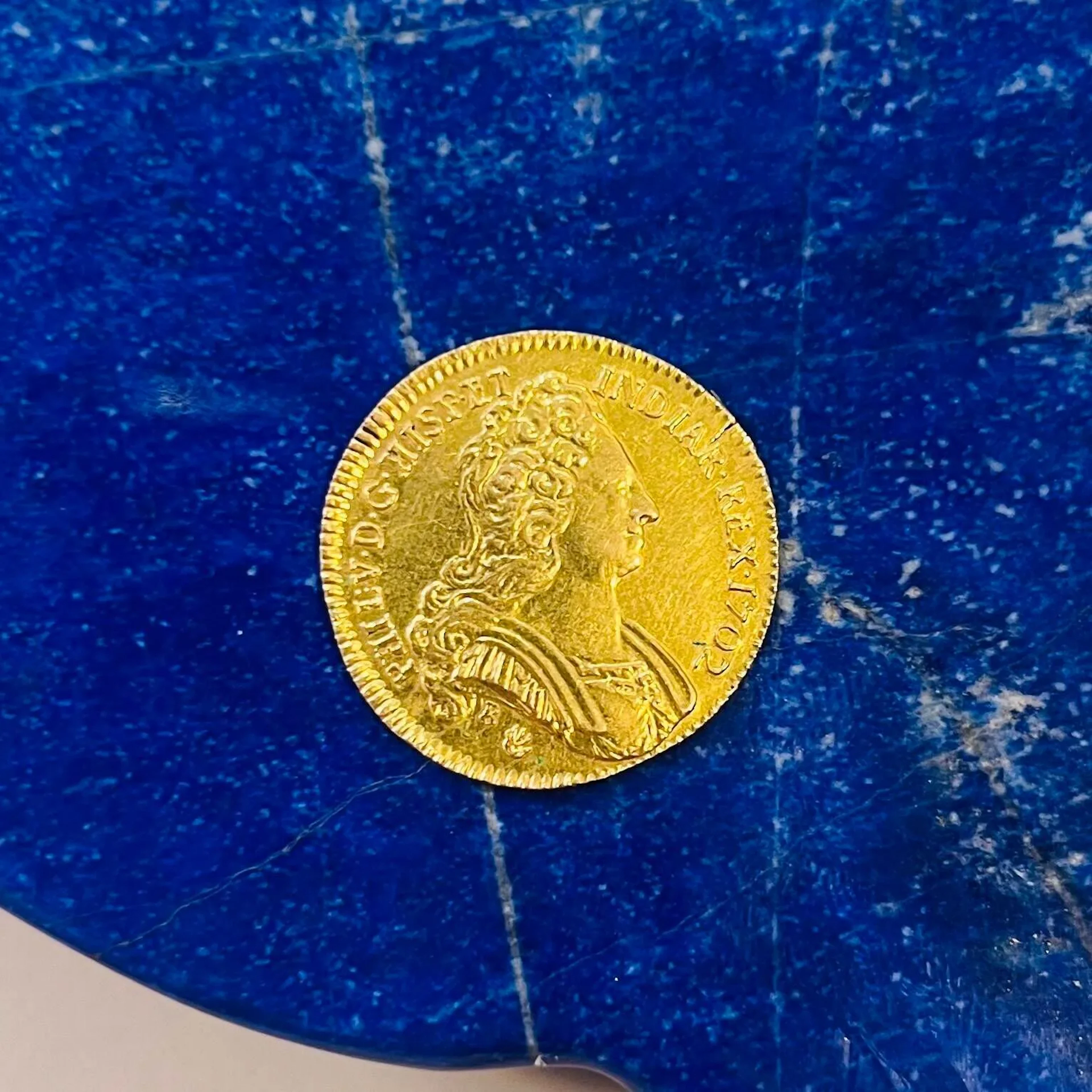 A modern gold coin minted from a low-purity gold token issue - Lot 10
