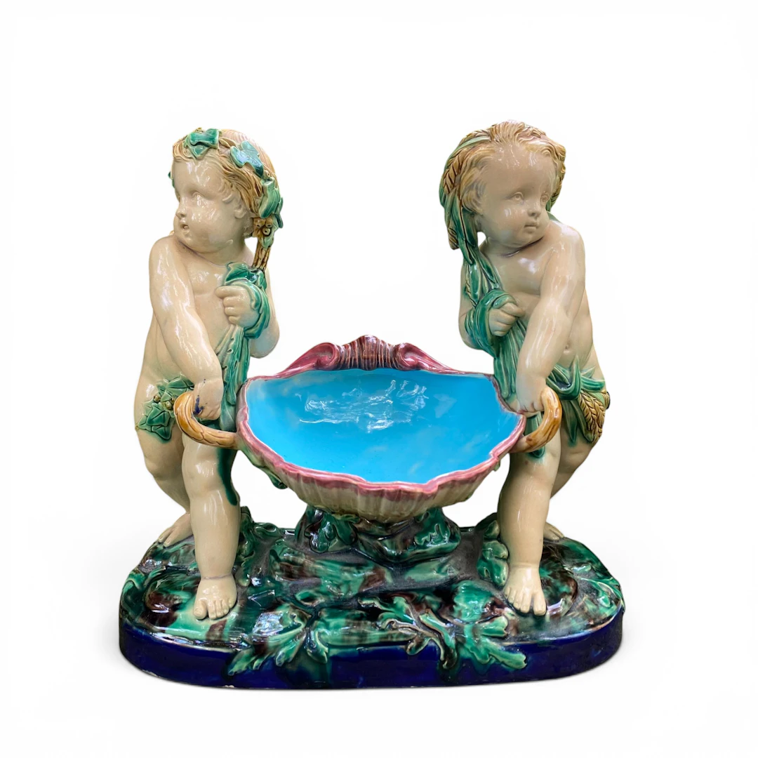 Minton Majolica cherubs basket, dated 1868.