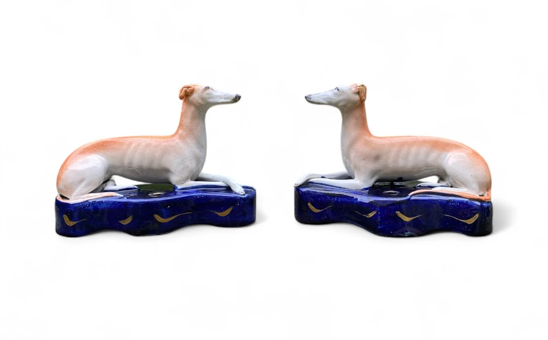 Pair Staffordshire Greyhound quill holders, c. 1850.