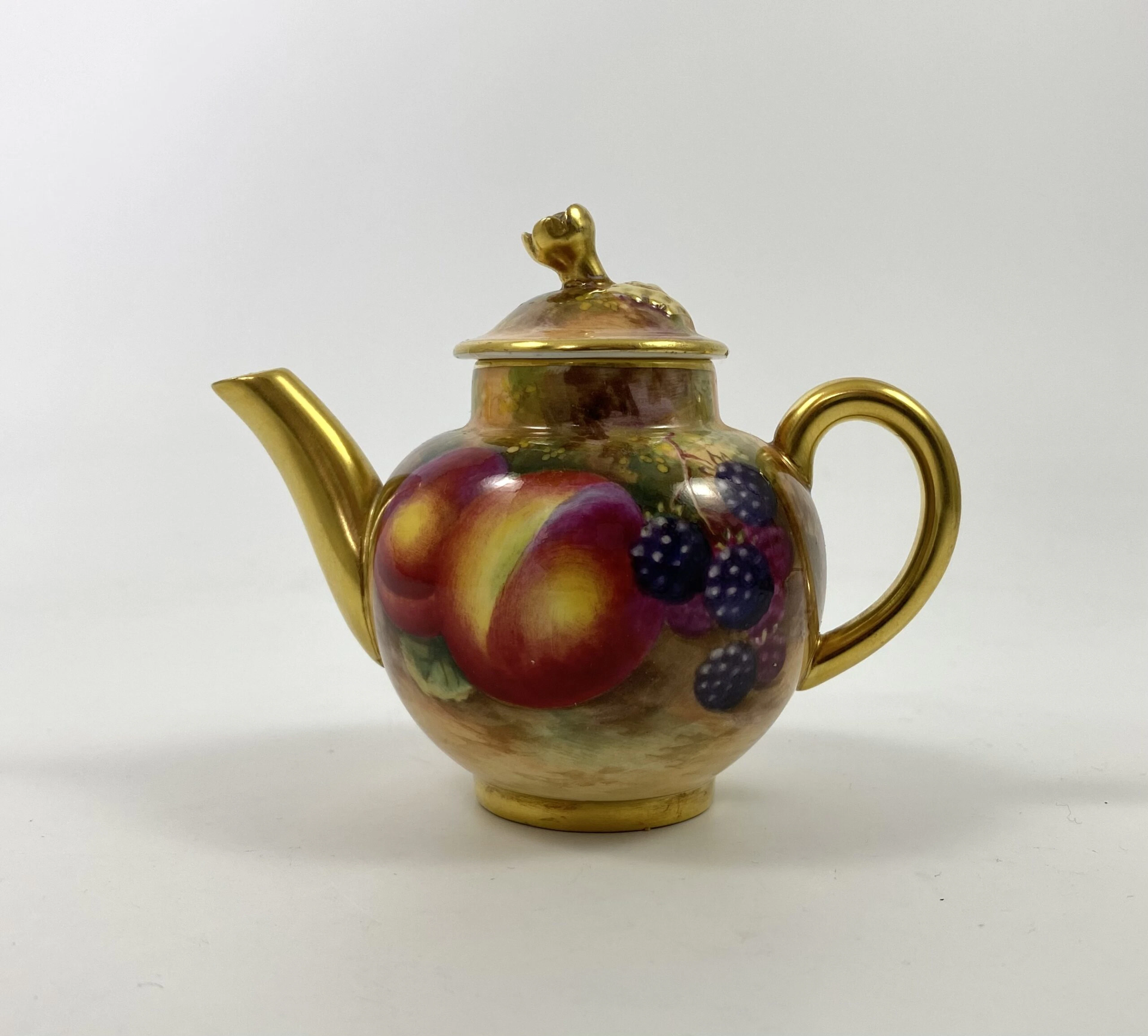 Royal Worcester ‘Fruit’ miniature teapot. Harry Ayrton, d. 1953.