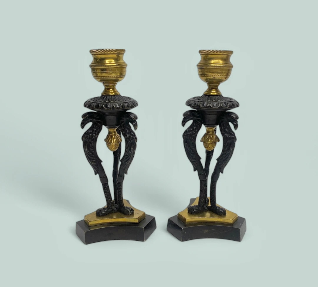 Pair Regency ormolu Griffin candlesticks, c. 1820.