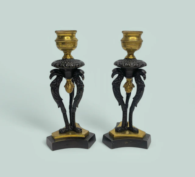 Pair Regency ormolu Griffin candlesticks, c. 1820.