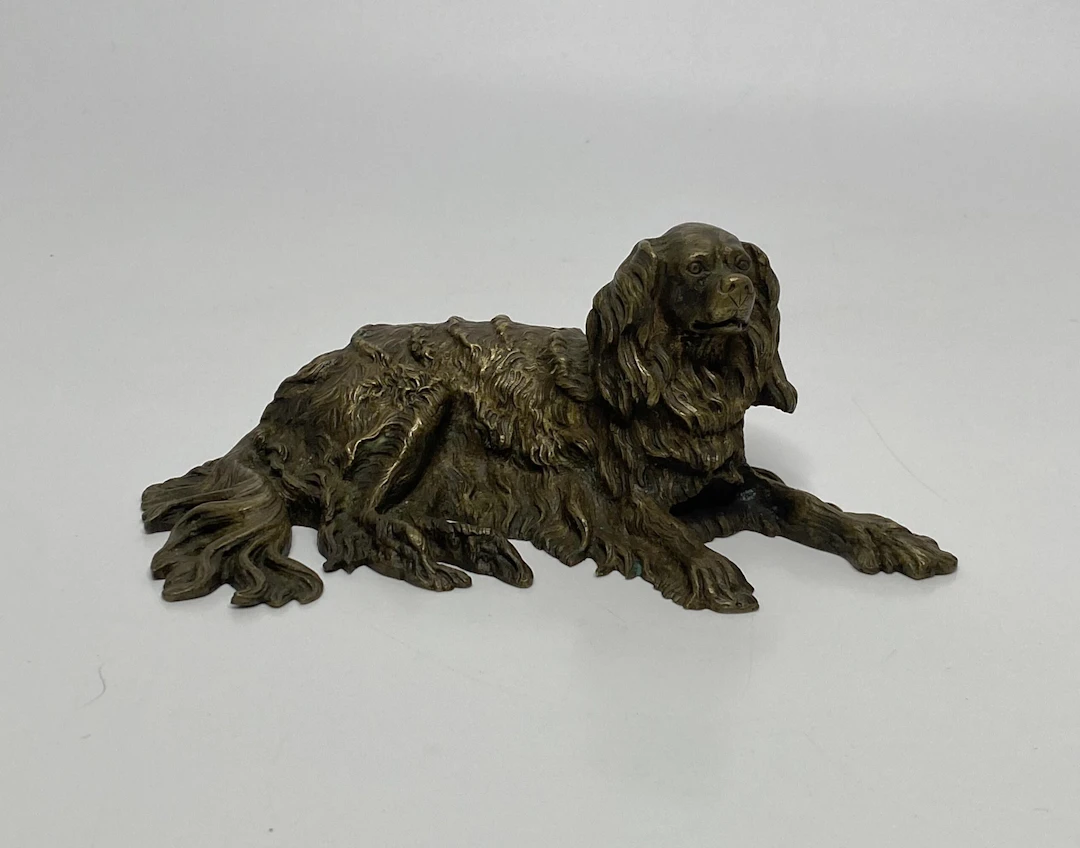 English bronze recumbent Spaniel, c. 1840.