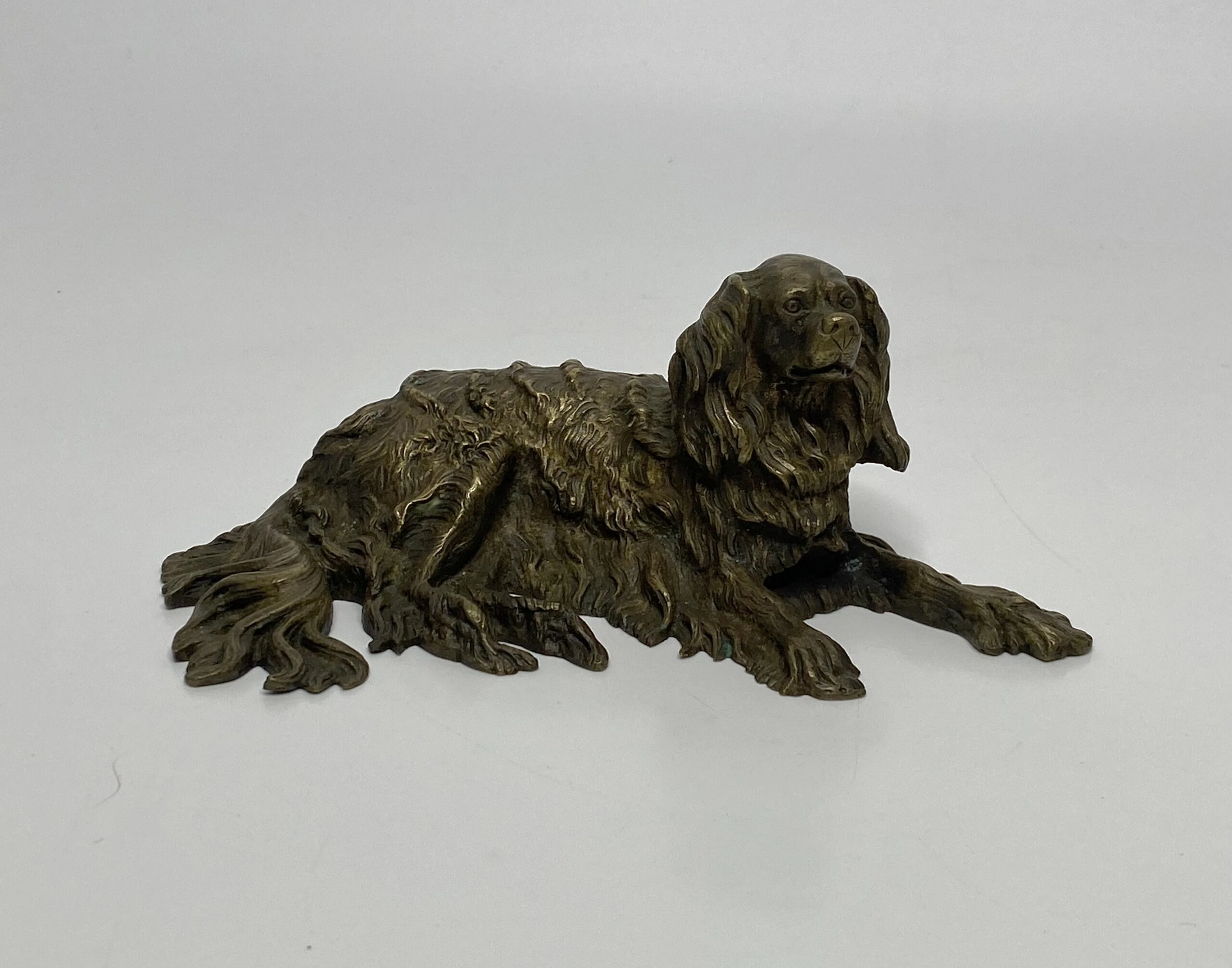English bronze recumbent Spaniel, c. 1840.