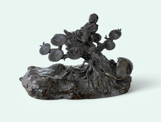 Japanese bronze okimono Kangai with a crane, Edo Period.