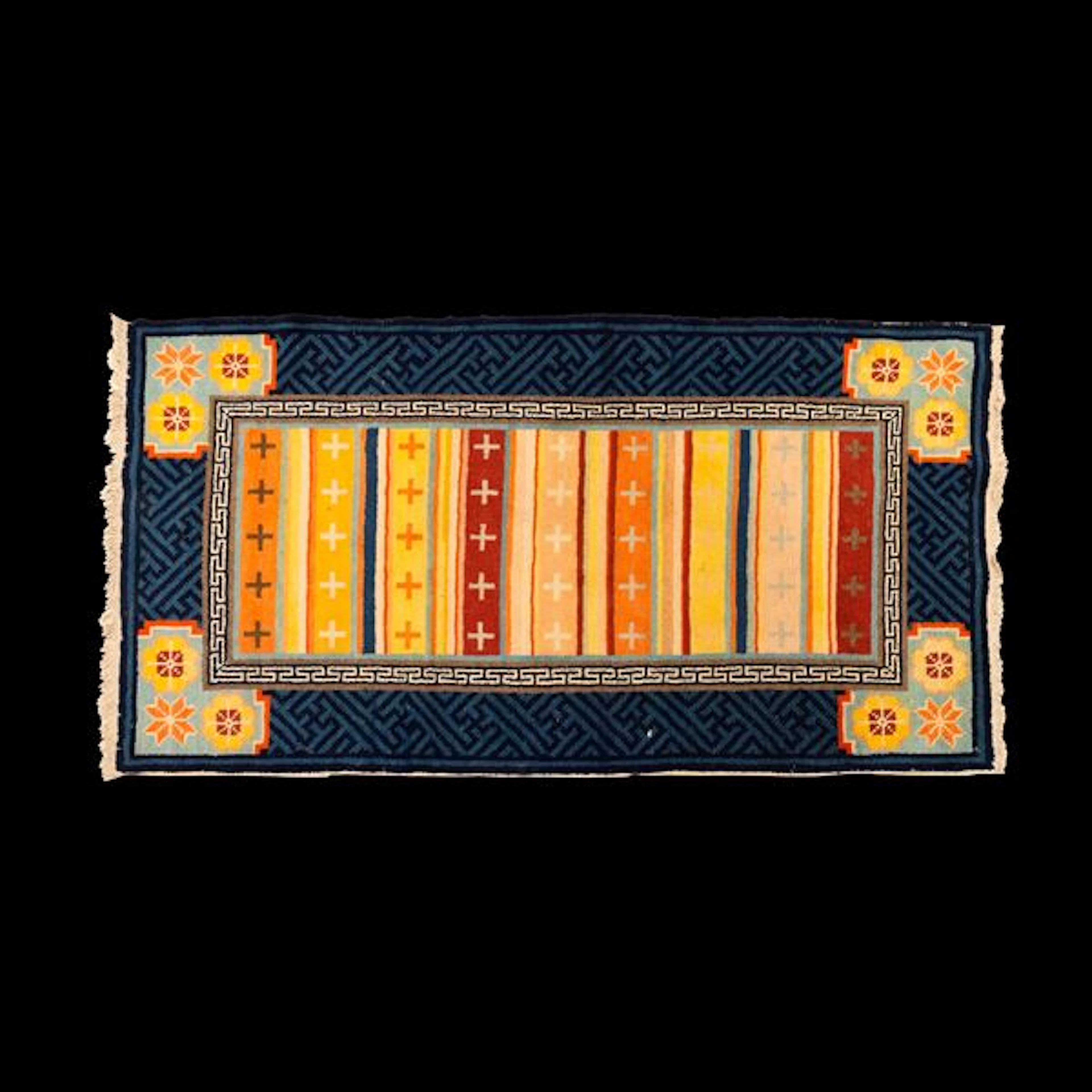 Tappeto con decori geometrici a fondo blu, Tibet, XIX secolo
