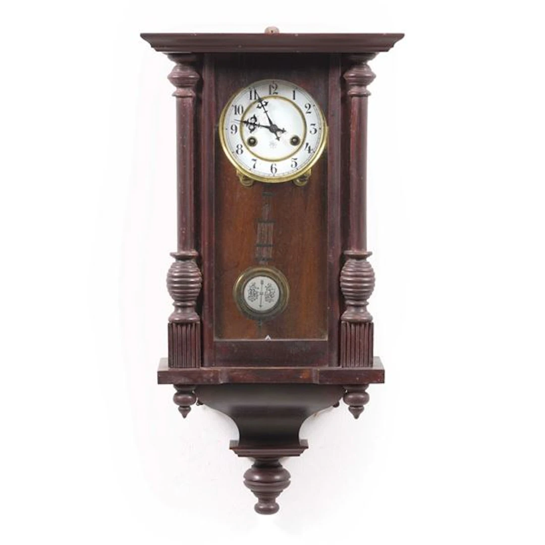 Orologio da parete in legno intagliato