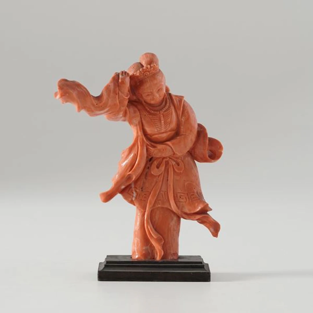 Small coral lady figure