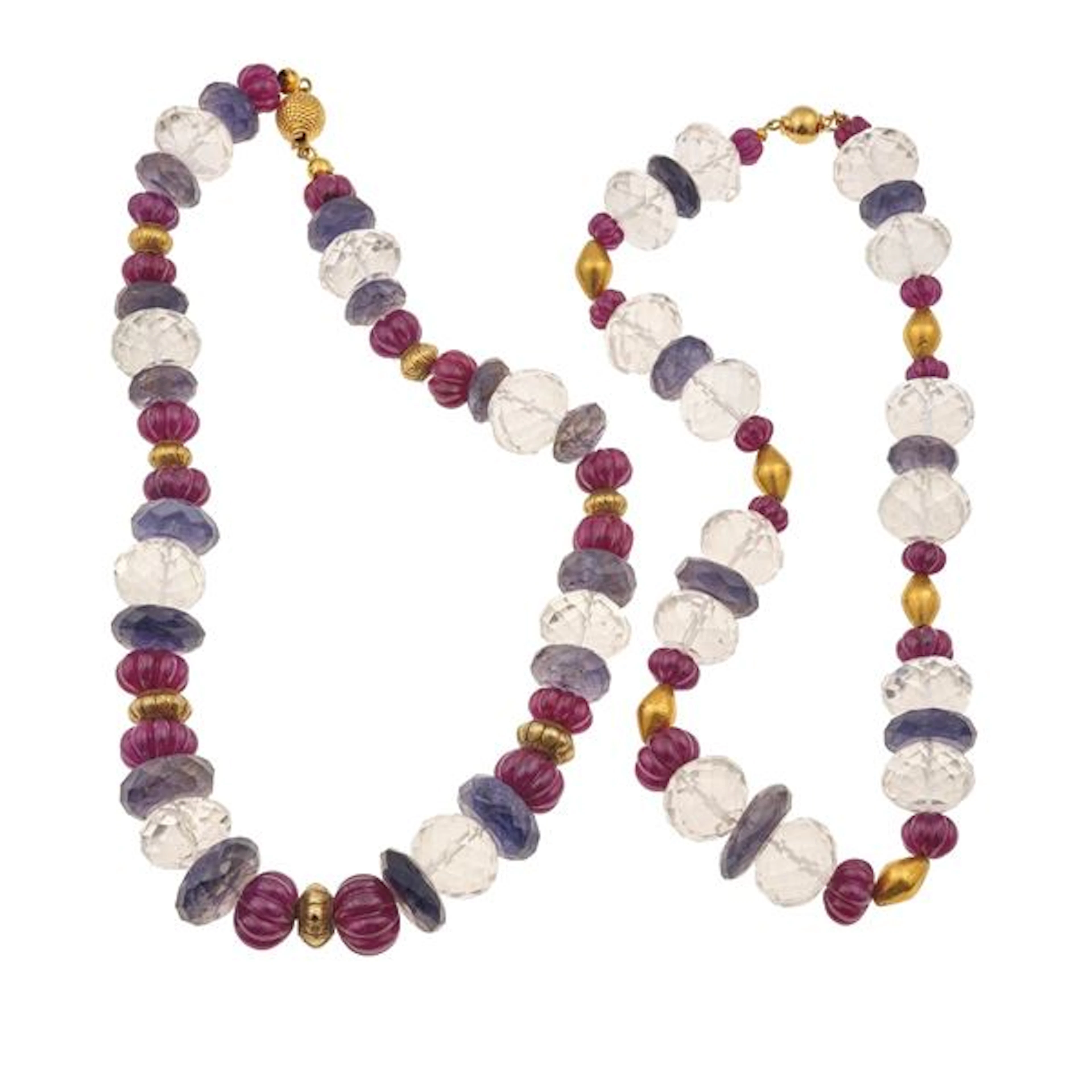 Two rock crystal, carved ruby, iolite and gold necklaces