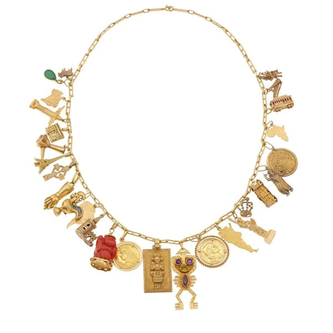 Gold, low-karat gold necklace with charms