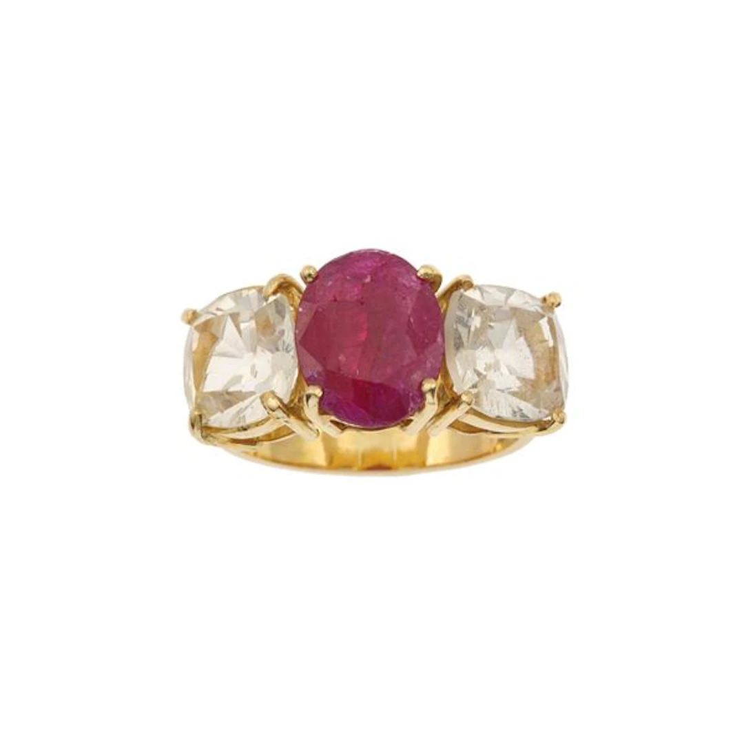 Treatment ruby, yellow sapphire and gold ring