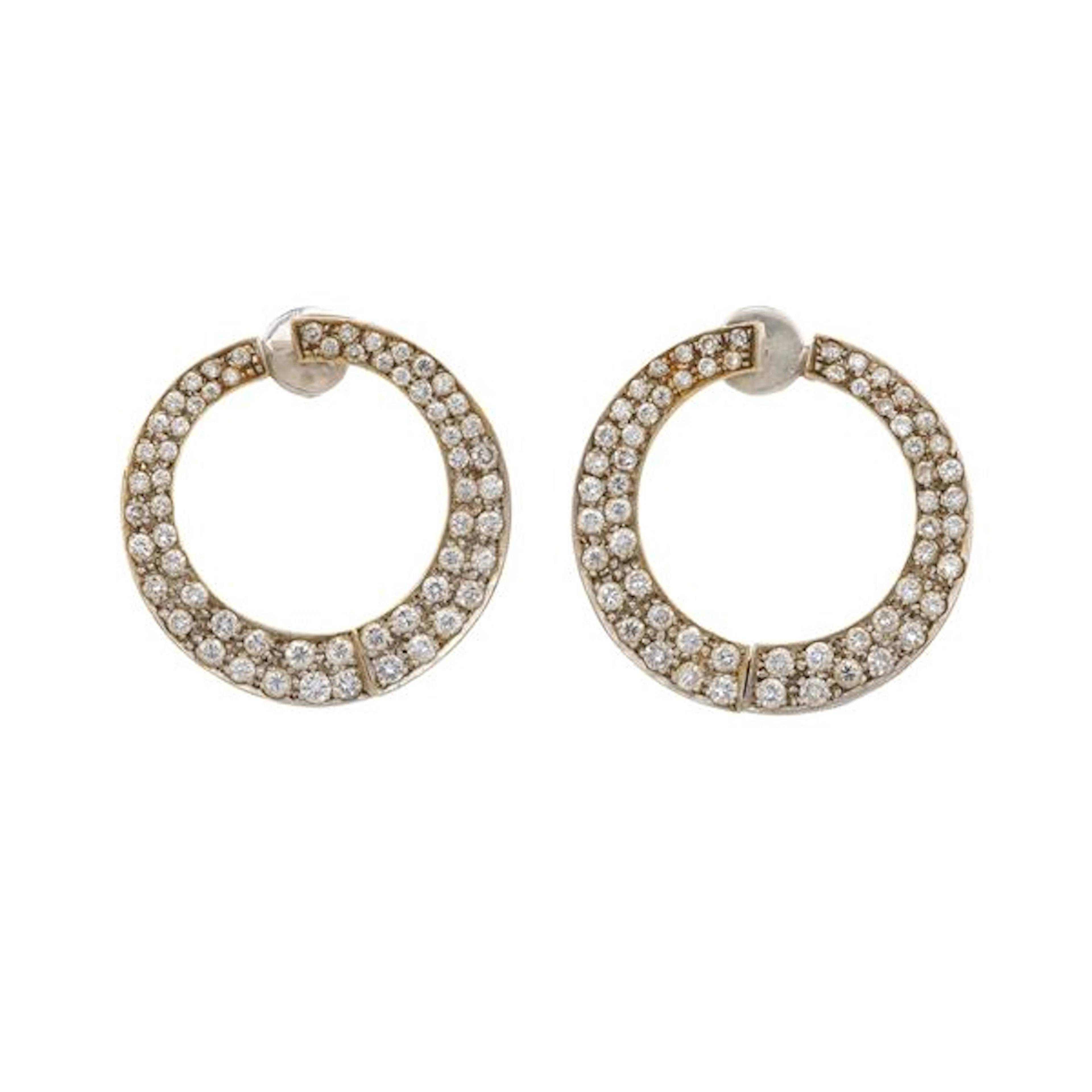 Pair of diamond and gold earrings
