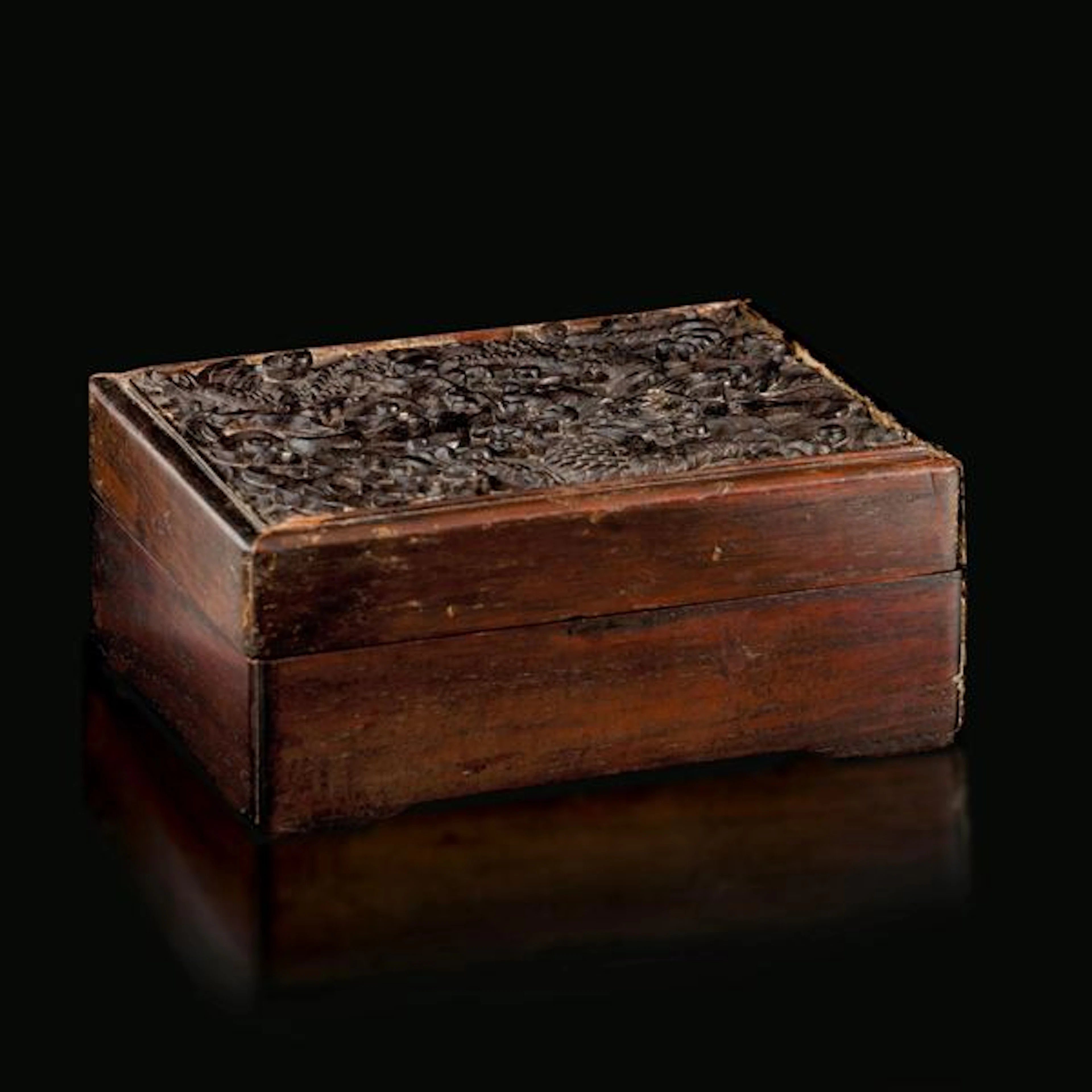 Carved hardwood box with dragon in the clouds, China, Qing Dynasty