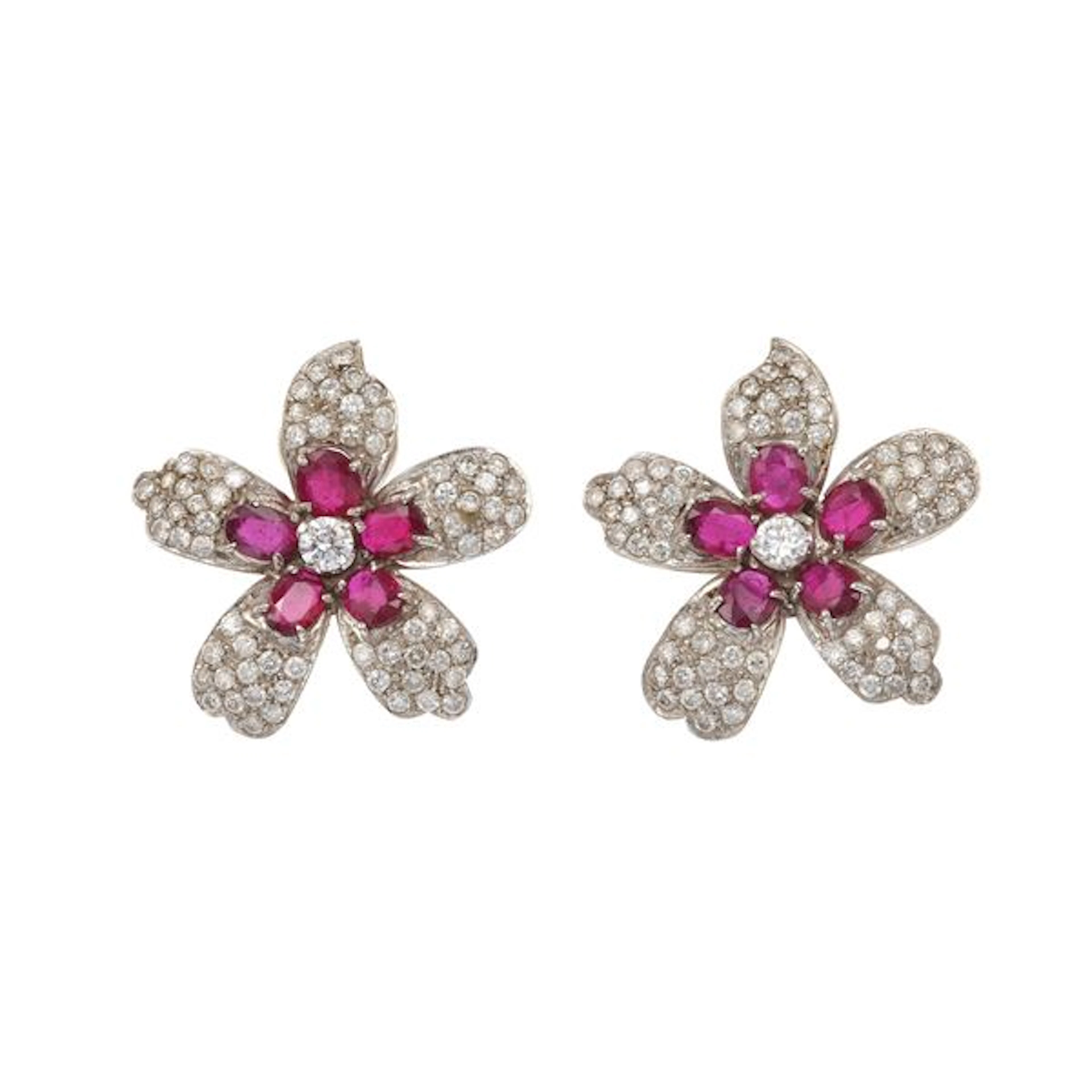Pair od ruby, diamond and gold earrings. One missing diamond