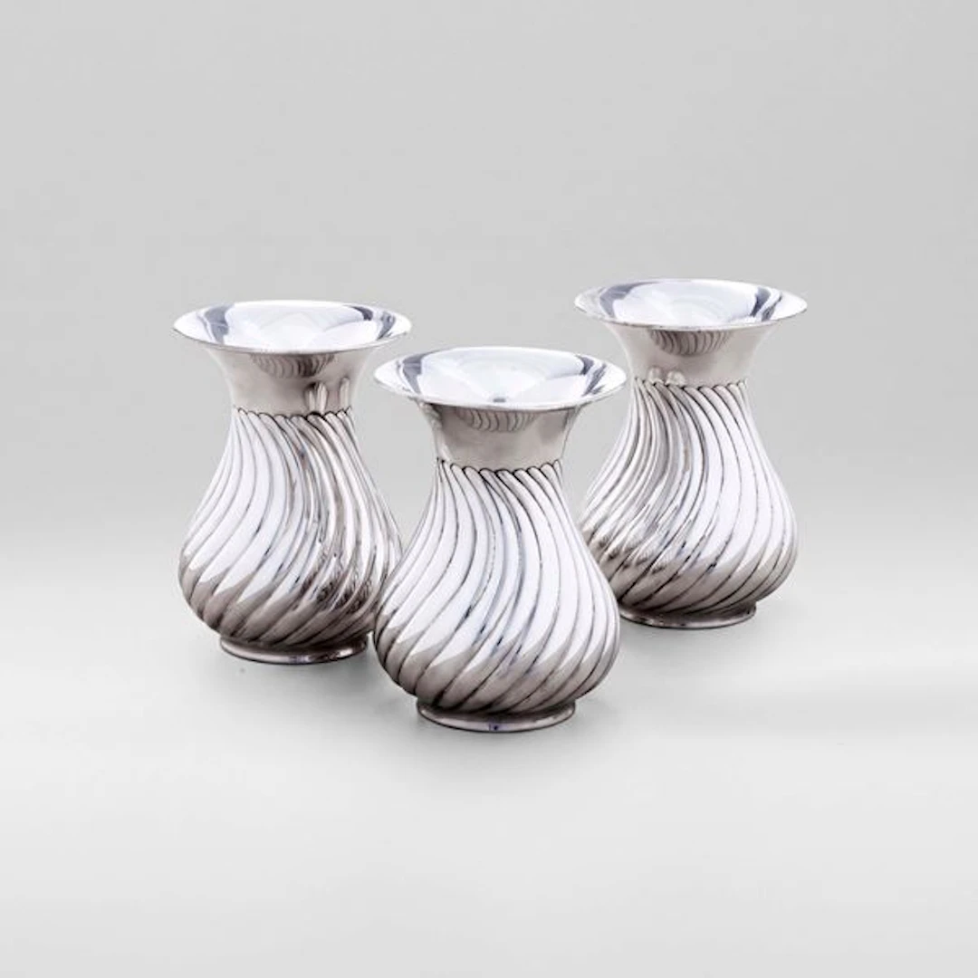 Tre vasi a torchon. Argenteria artistica padovana del XX secolo. Argentiere