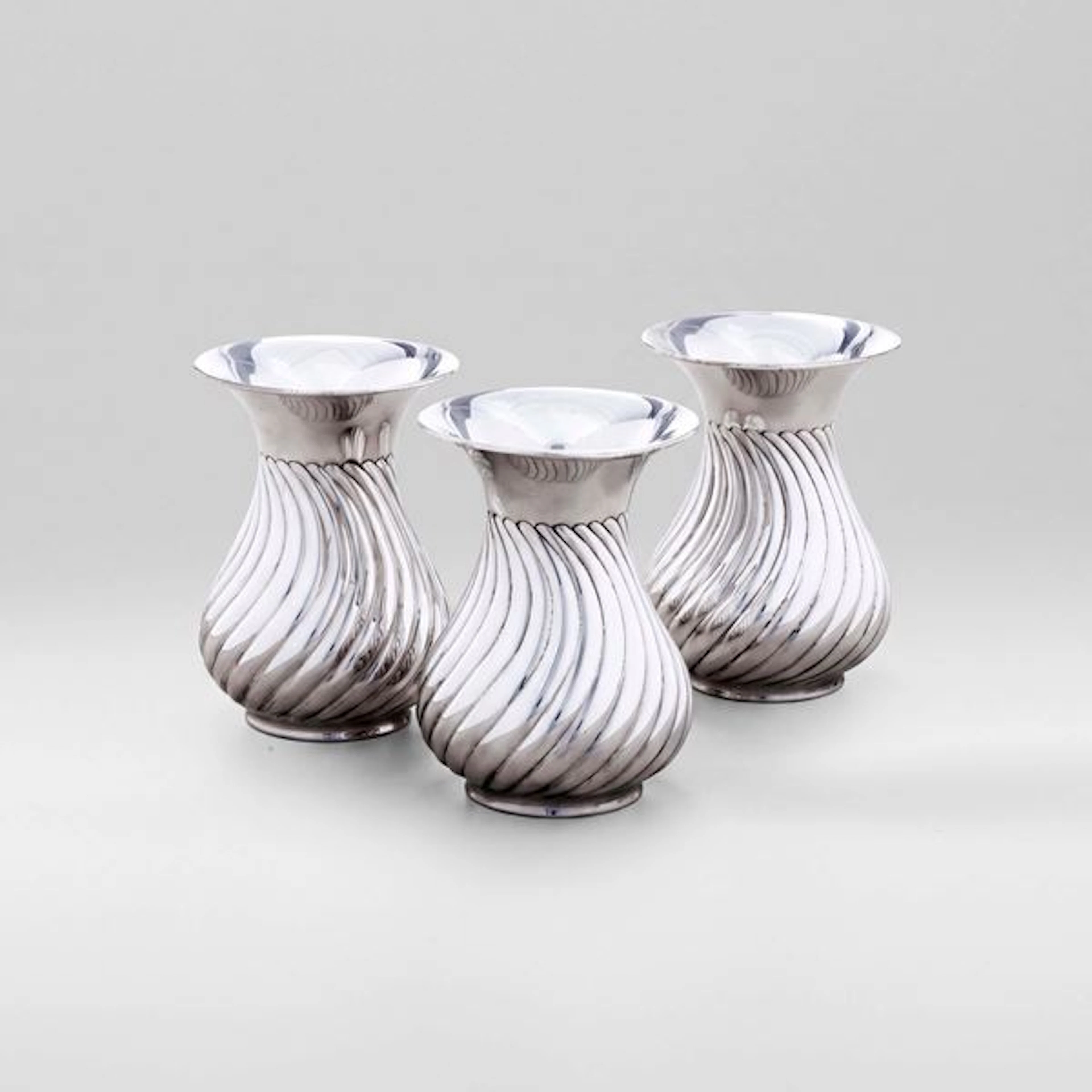 Tre vasi a torchon. Argenteria artistica padovana del XX secolo. Argentiere