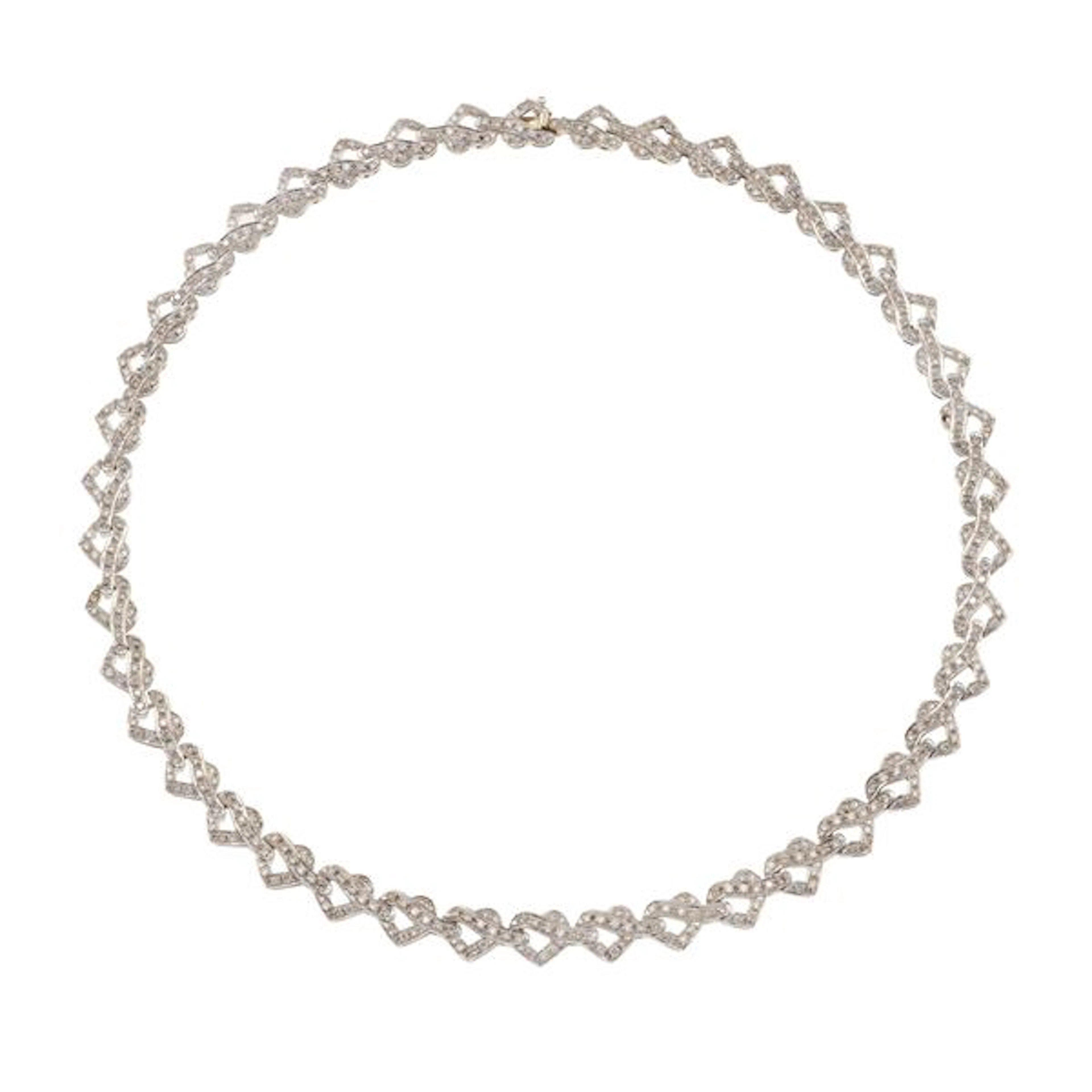 Diamond and gold "heart" necklace. One missing diamond