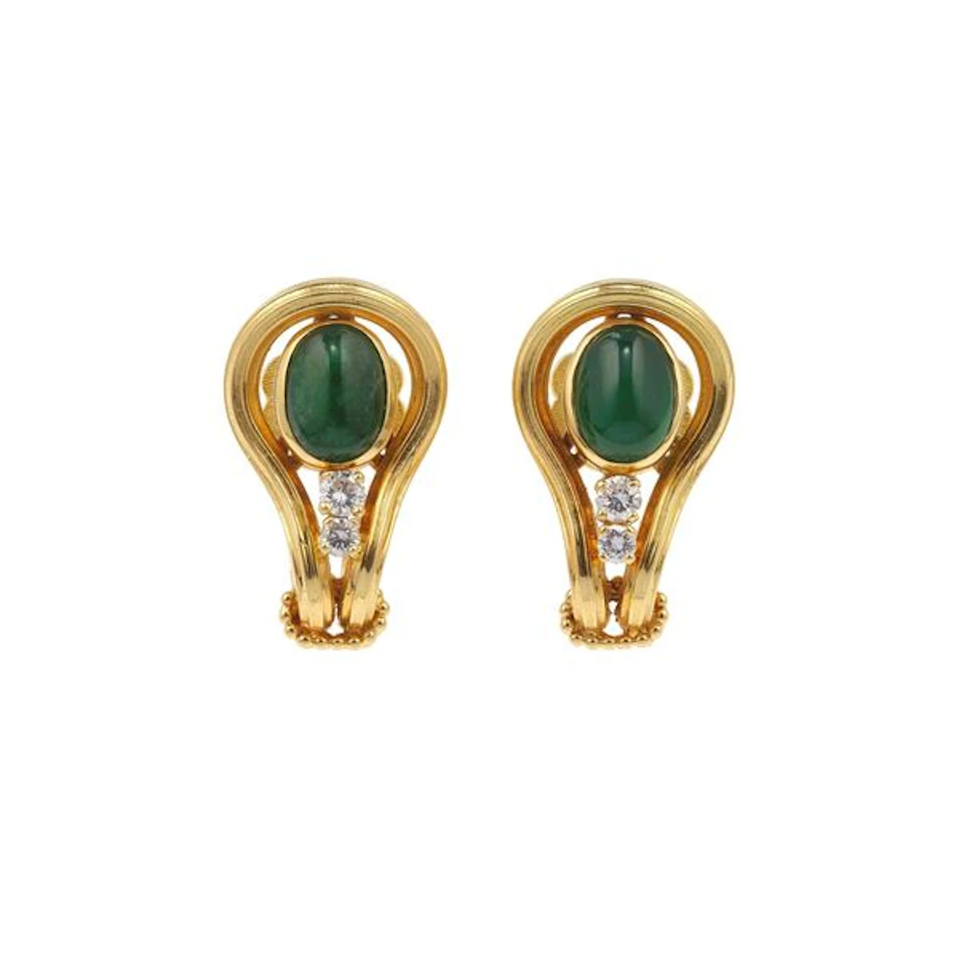 Pair of emerald, diamond and gold cufflinks. Incomplete set