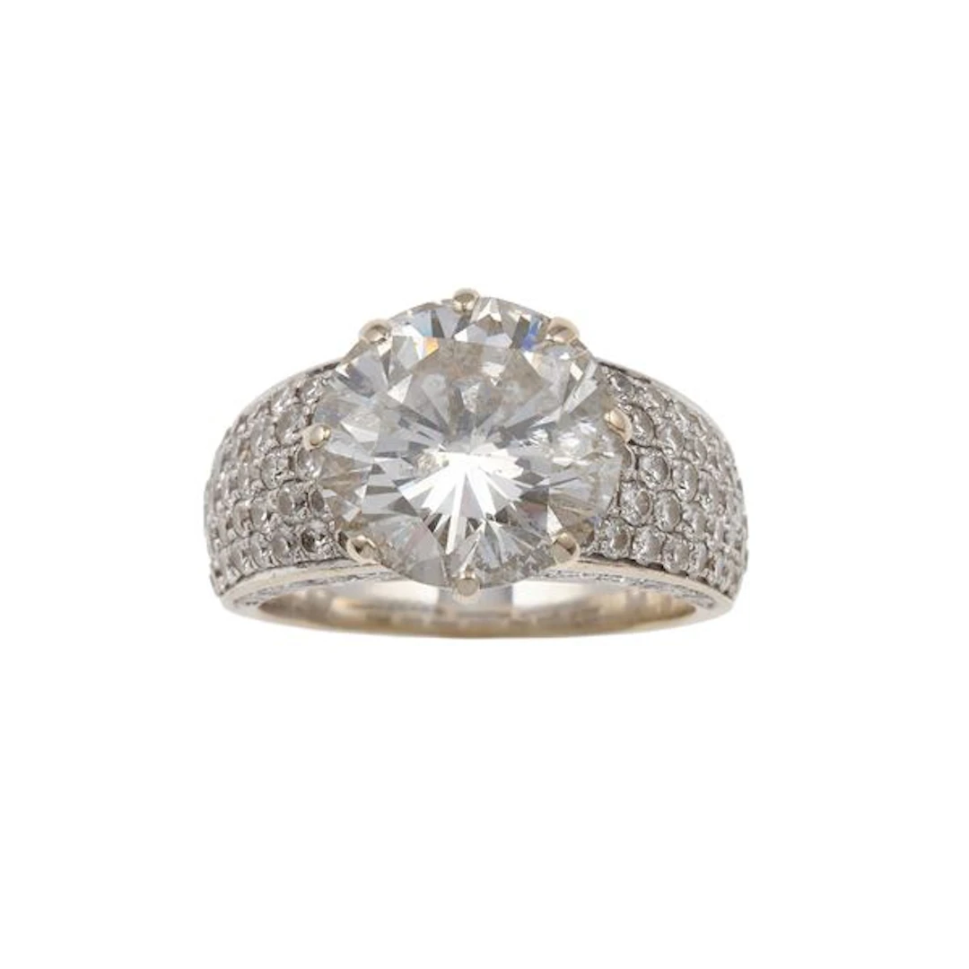 Brilliant-cut diamond weighing 7.18 carats approximately and gold ring